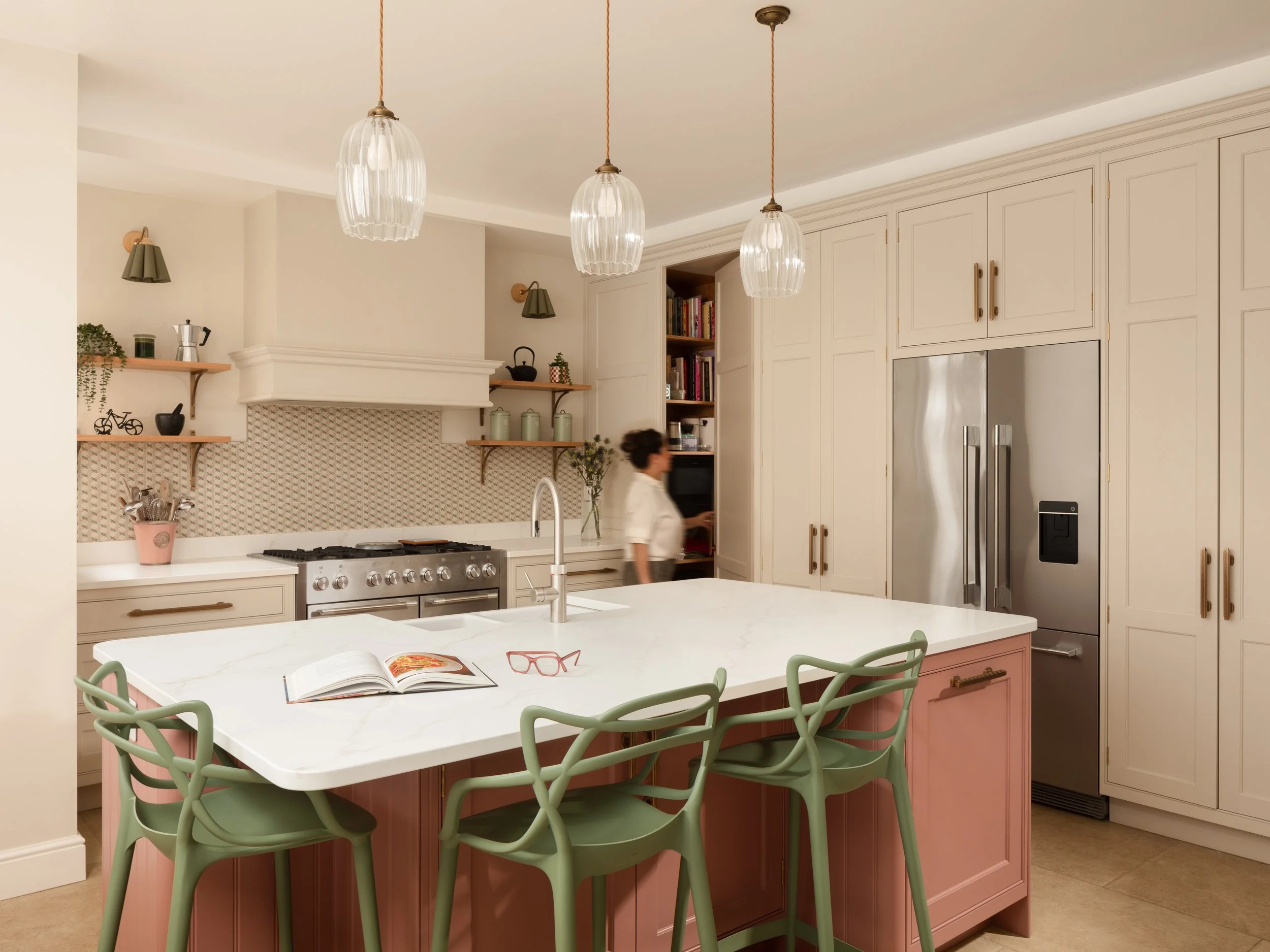 Luxury Shaker Kitchen, large quartz worktop, tiled splashback, sconce lights, pendants by Jim Lawrence, Quooker tap, hand painted in Little Greene off white with a pink island. Period property in Barnes.