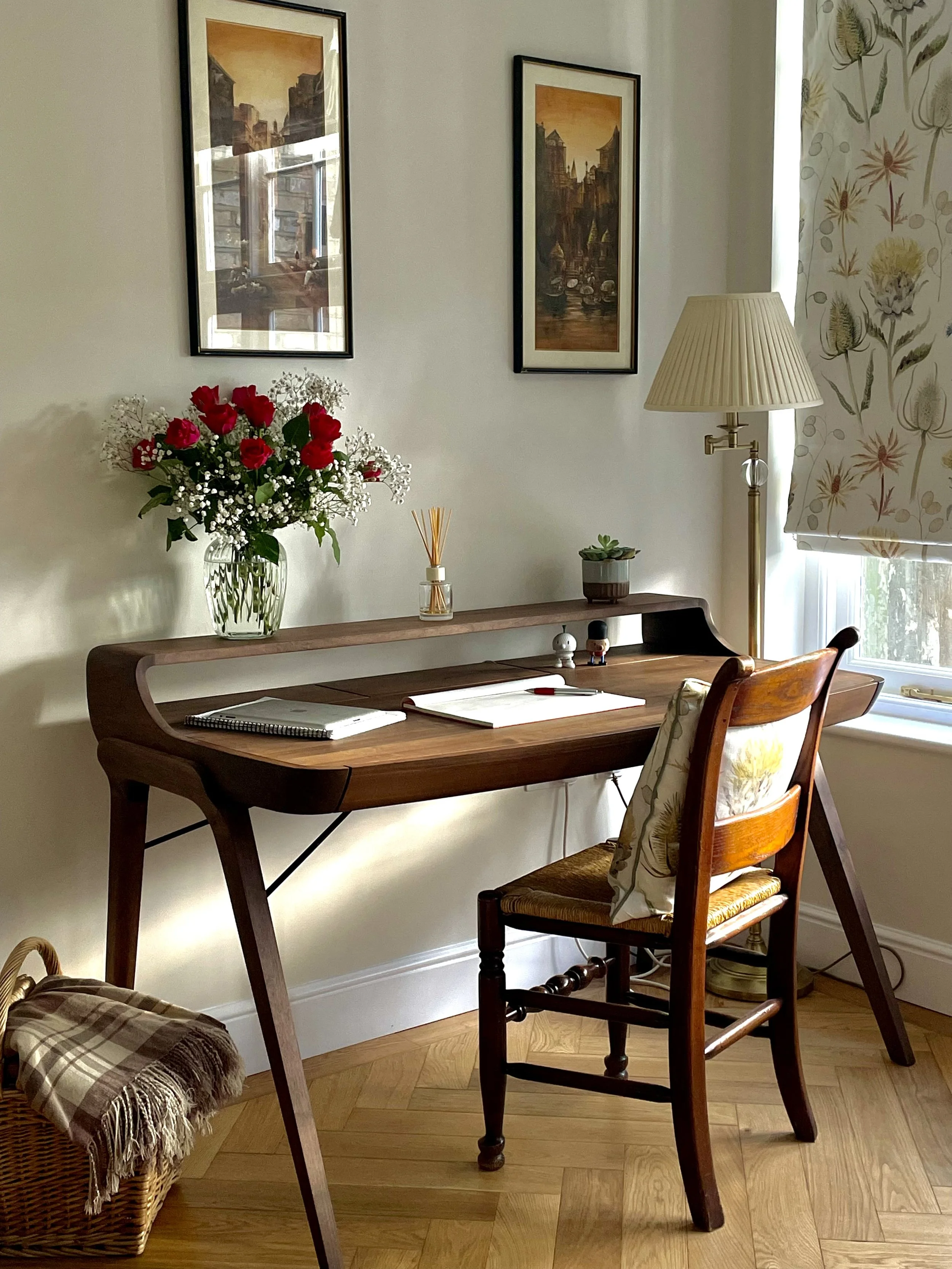 Neat reading desk in walnut. parquet flooring with brass inlay. Made to measure blinds in Sanderson fabrics.
