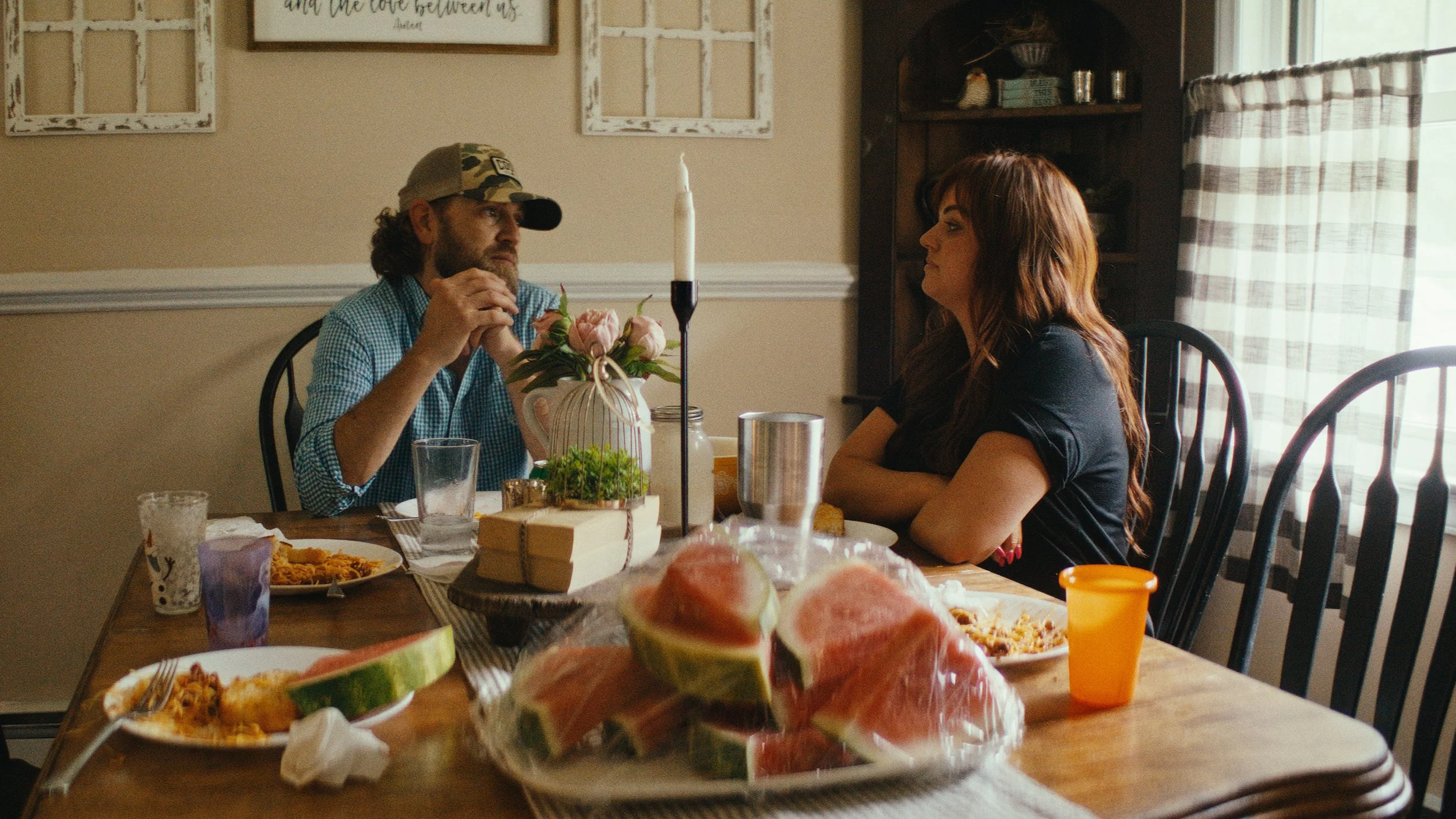 Jonathan and Rachel Lovelace at their dinner table.jpg