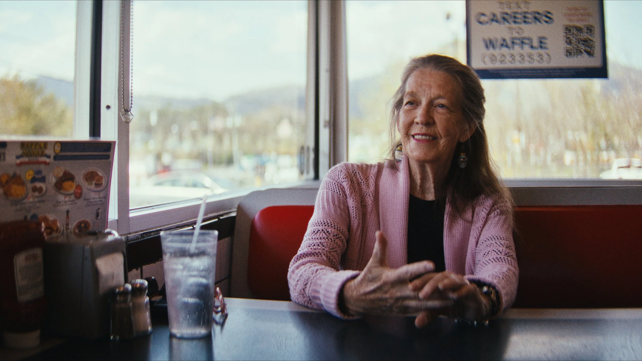 Gail Mull sitting at the Canton Waffle House.jpg