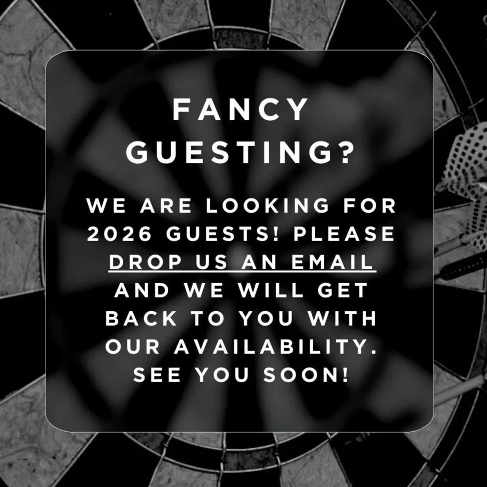 A message on a dartboard background stating the business is accepting 2026 guests and requesting an email contact for availability updates.