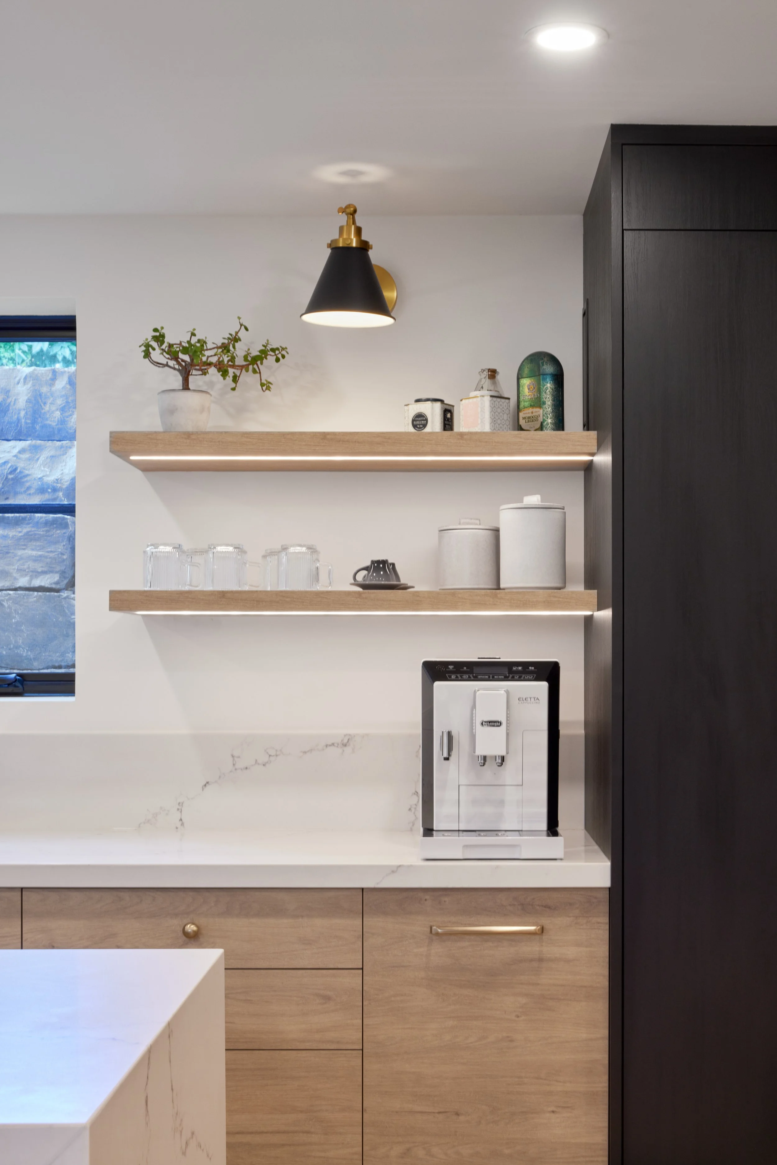 Modern basement kitchen, kitchen cabinets Mississauga, interior design. shop near me, Recommended popular renovation designer near me. Modern basement kitchen features natural wood cabinets and black accents, creating a sleek, contemporary look. The 