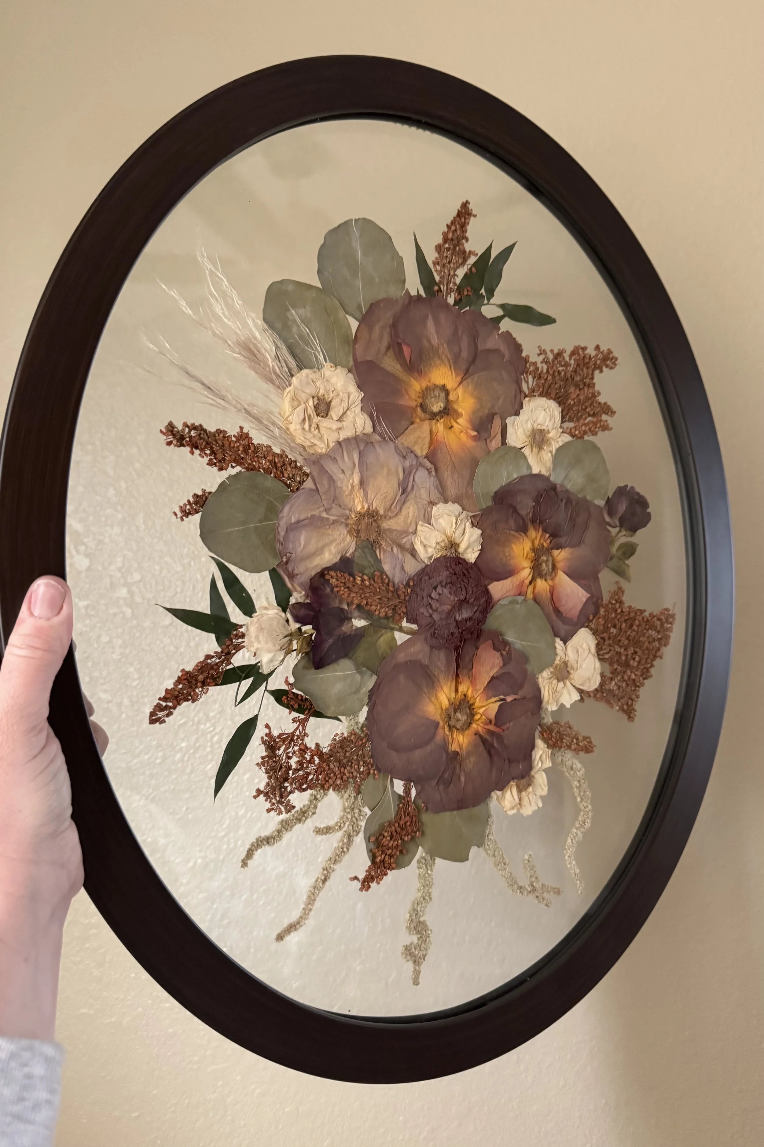 Black Oval Pressed Flower Frame with Fall Bridal Bouquet.jpeg