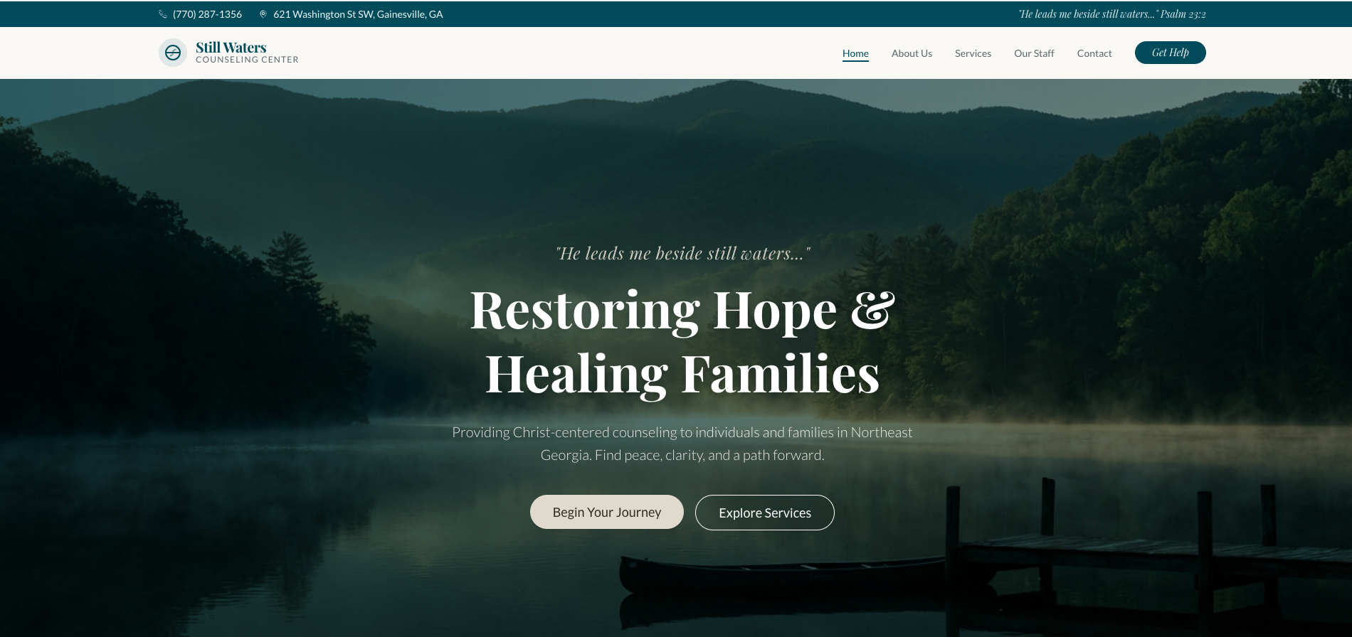 Screenshot of the Still Waters Counseling Center website featuring a serene lake with a dock, surrounded by lush green mountains, with the center's name and tagline about restoring hope and healing families.
