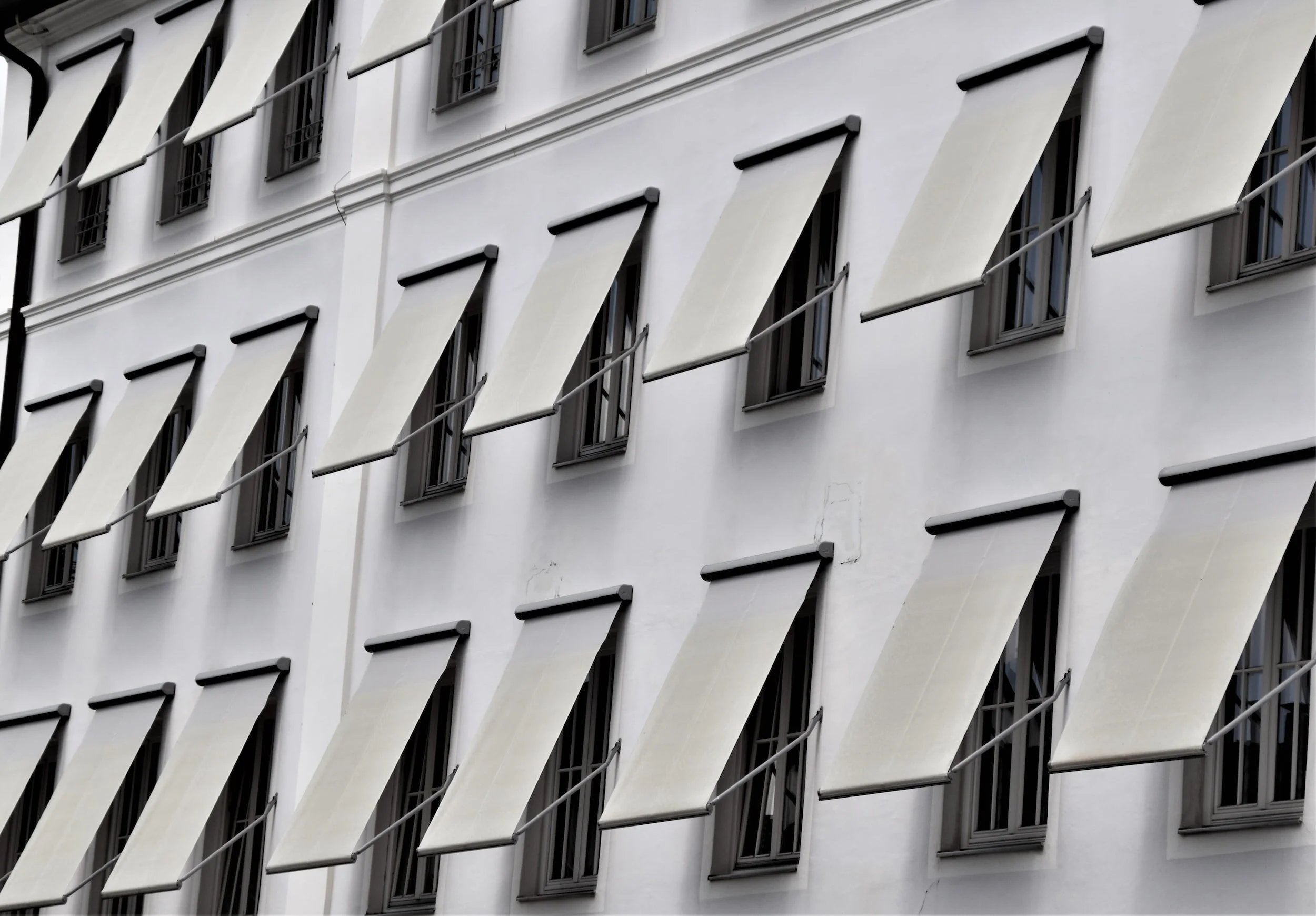 Awnings over a building's windows.