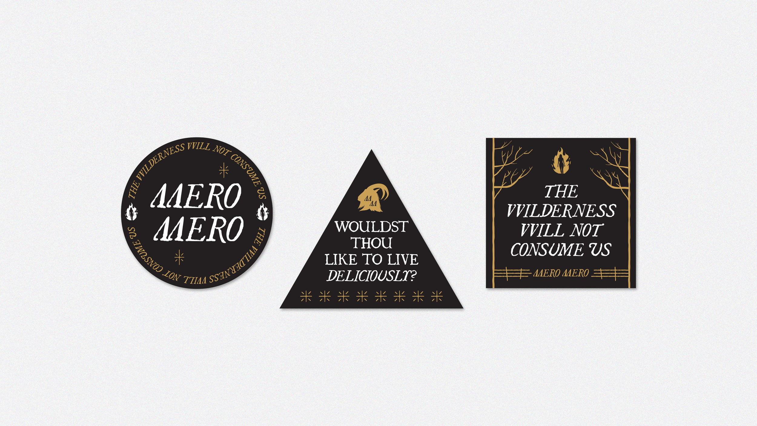 Three black and gold designs: a circular badge with the text 'The Wilderness Will Not Consume Us' a triangular badge with a goat head and the text 'Wouldst Thou Like to Live Deliciously?,' and a rectangular poster with a person silhouette, trees, and