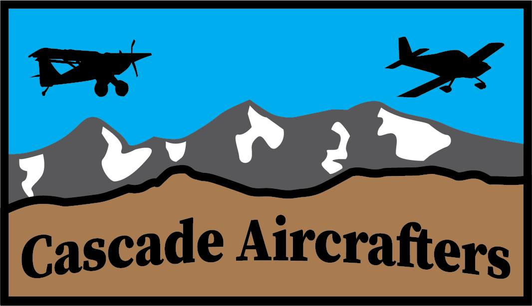 Silhouettes of two airplanes flying over mountains with snow, blue sky background, and the text 'Cascade Aircrafters' at the bottom.