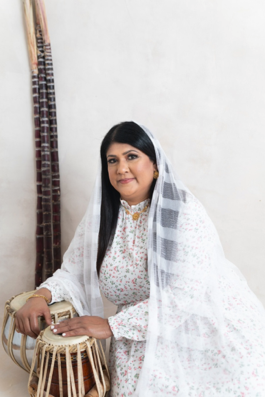 Patricia Raghunandan AKA Sookranie Dhanpat, originally from Mahaica, Guyana 

The Orhani

When we remember our grandmothers, "Agi" and "Nani" we remember the way they prepared to attend a religious or cultural event. The draping of the simple white o