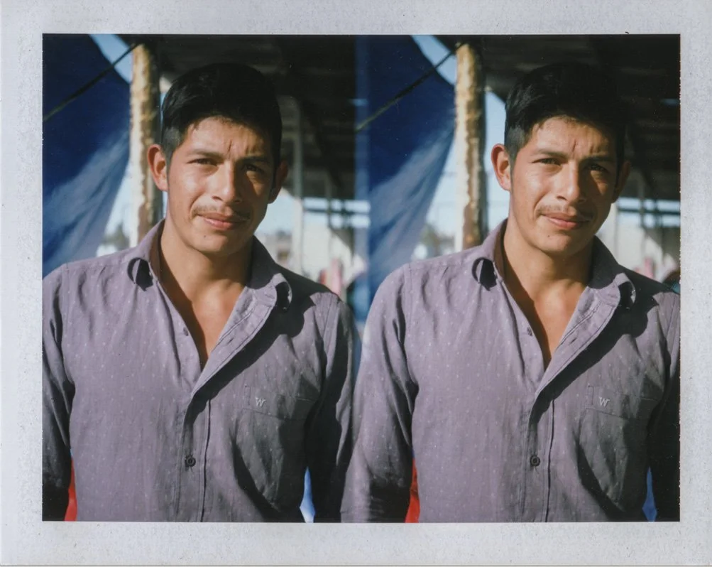 Polaroid portraits from the migrant caravan by photojournalist Alex Cave.