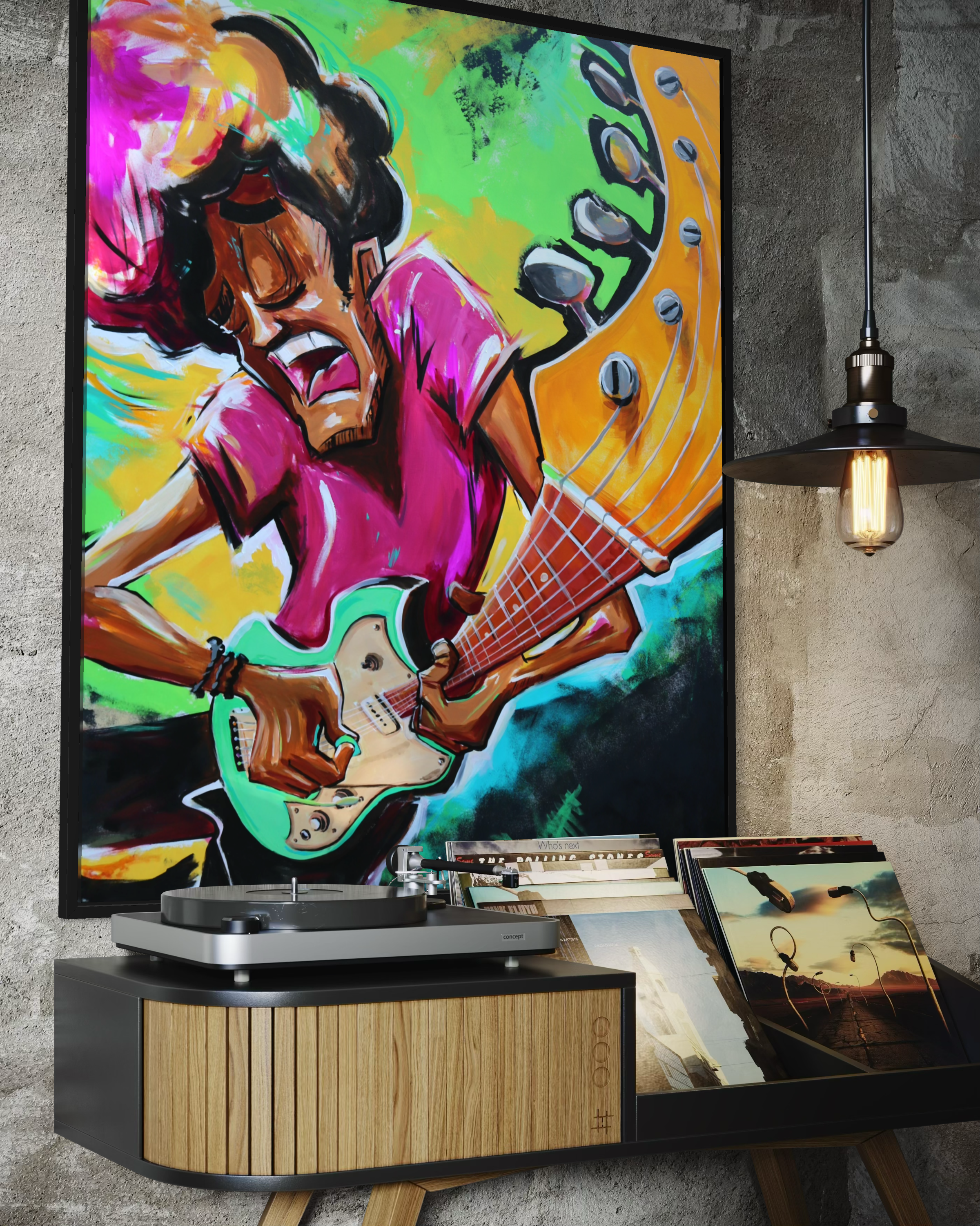 A colorful painting of a singer with curly hair, dressed in pink, playing an electric guitar with a bright yellow background and a green splash behind her. The painting is framed and displayed on a textured gray wall.