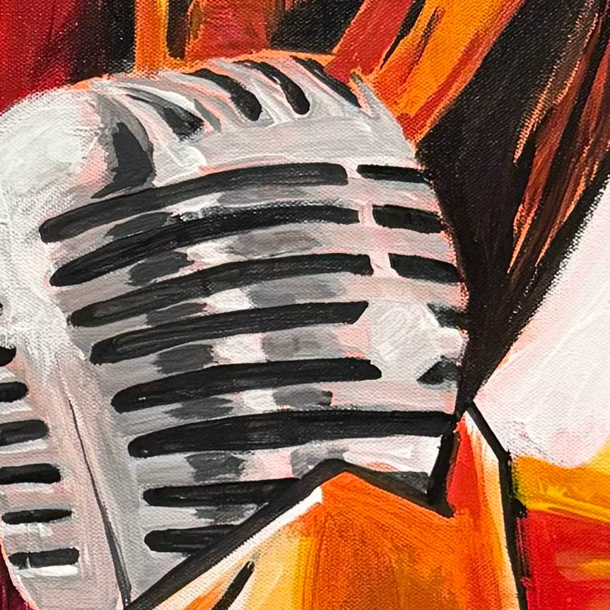 Close-up of a vintage microphone with an abstract colorful background.