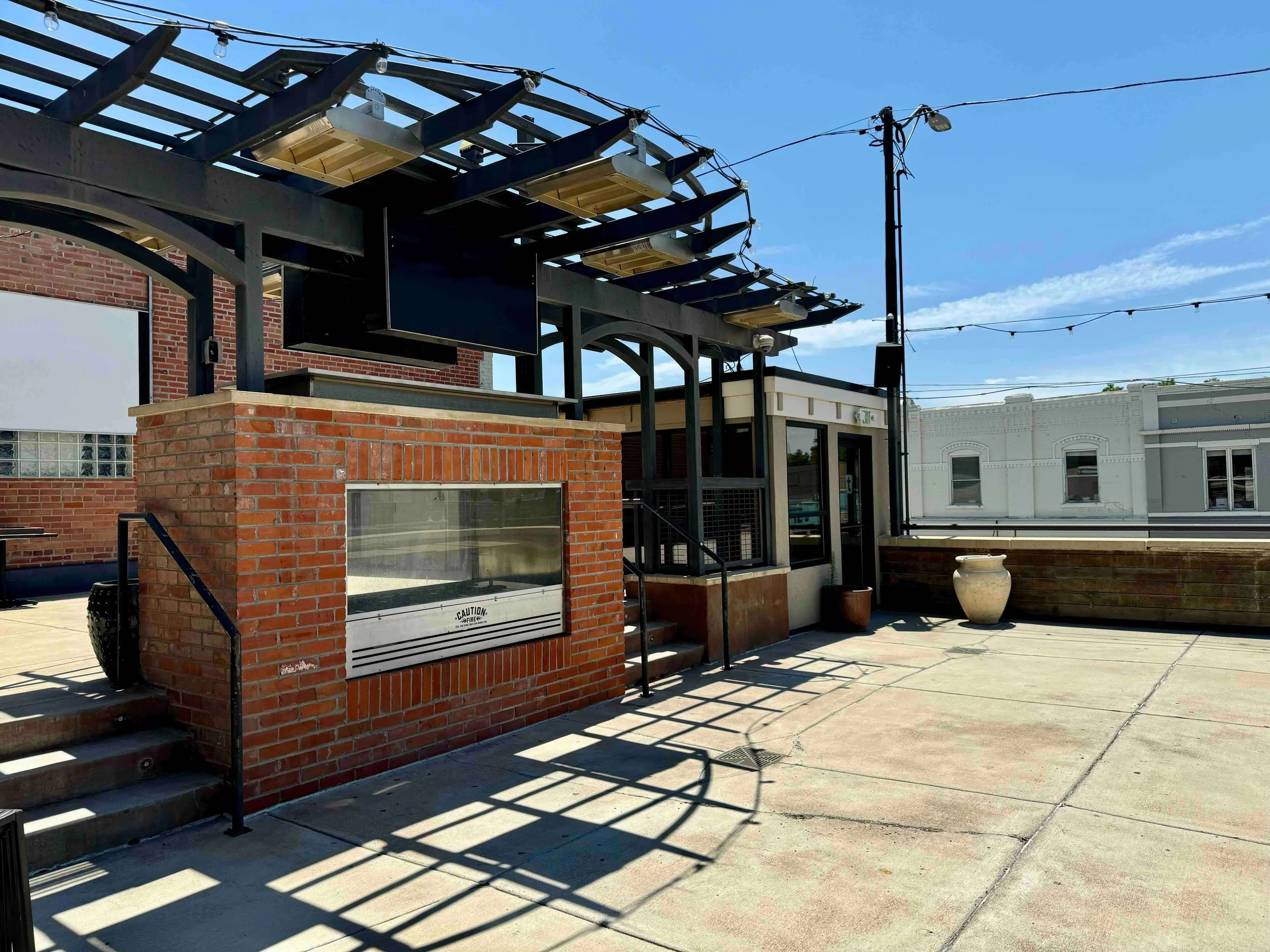 tavern-littleton-2589-west-main-street-colorado-restaurant-rooftop-fireplace-tv.jpeg
