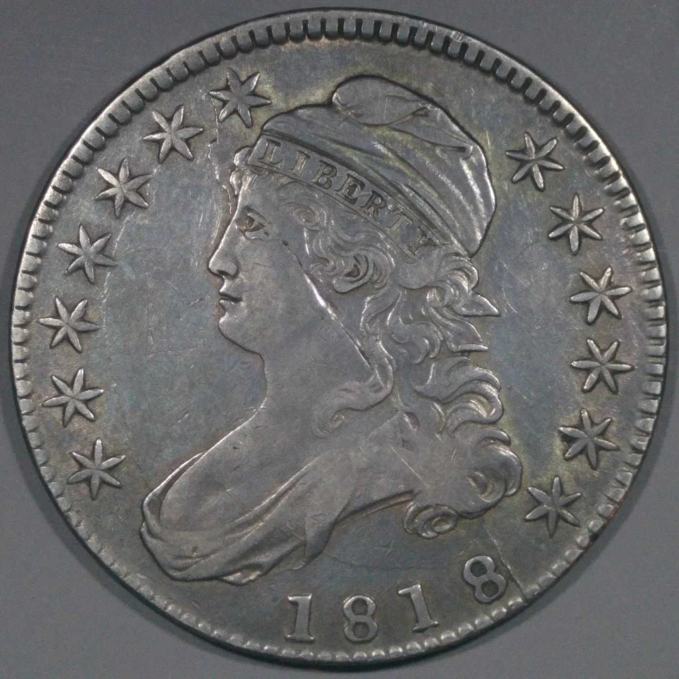 NGC_6973625-001 - 1818 Capped Bust Half Dollar - O115A - Obverse1.jpg