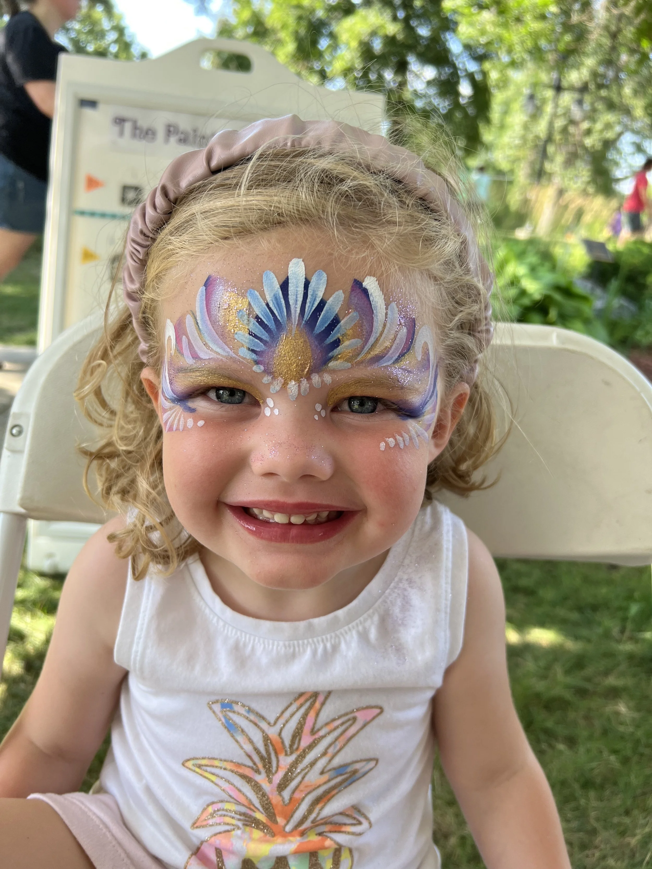 Girl with at an event with her face painted