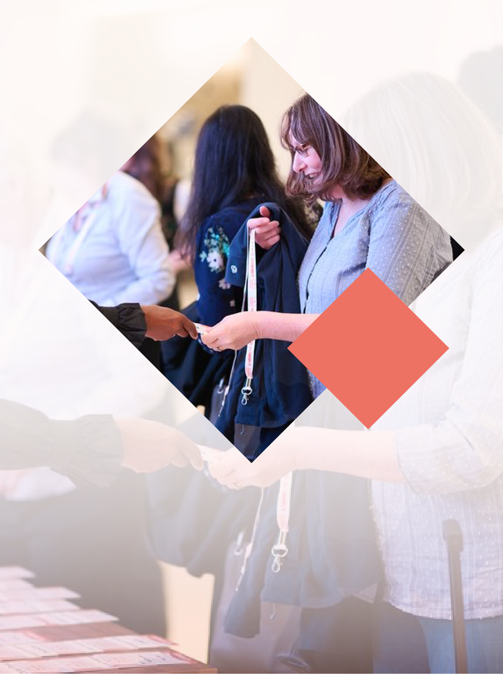 People at an event exchanging a lanyard