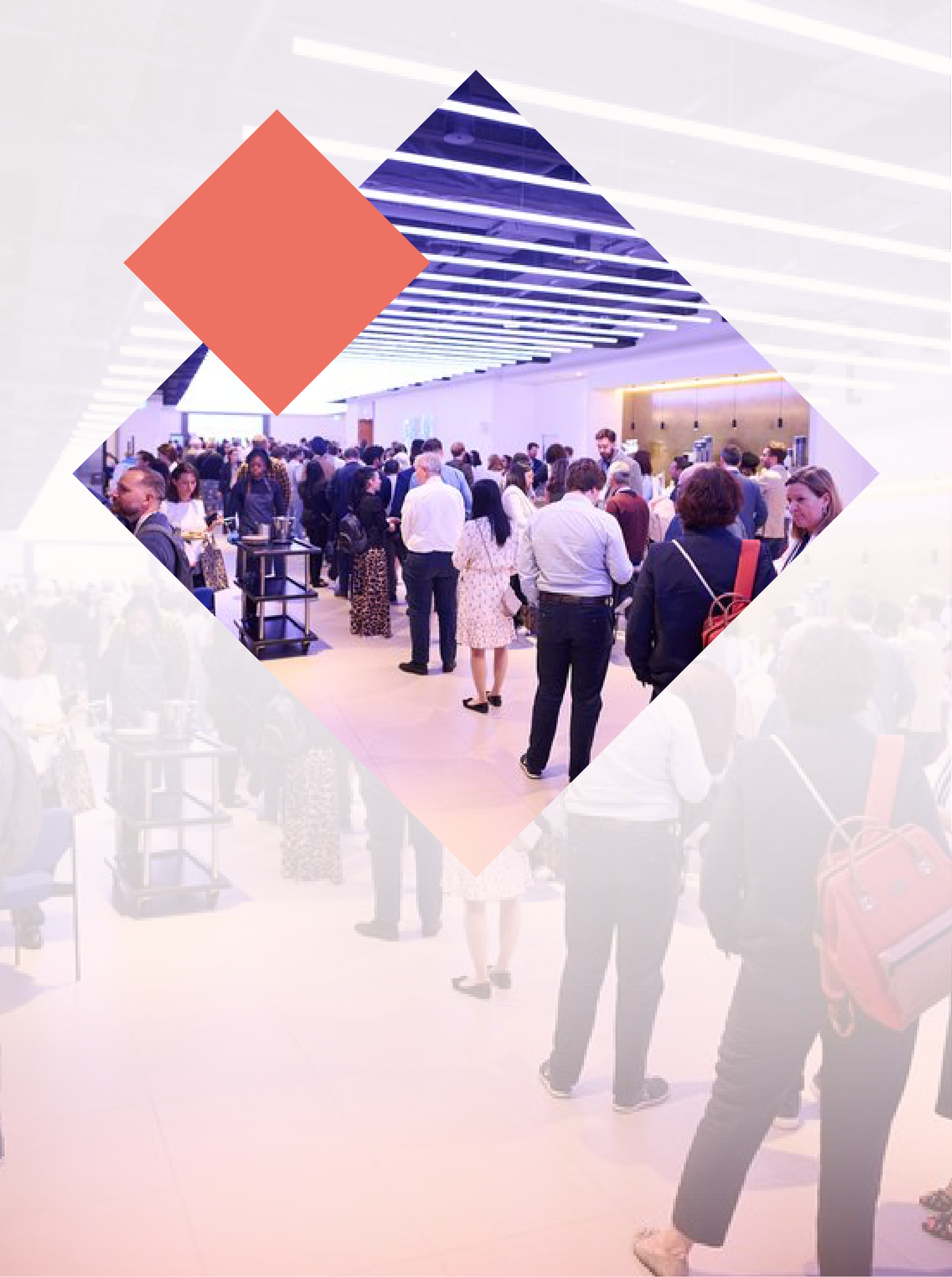 Crowd at indoor event with overhead lighting and orange diamond overlay