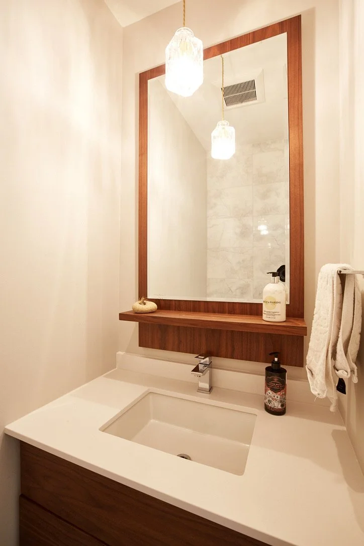 Custom vanity and mirror for a main floor powder room