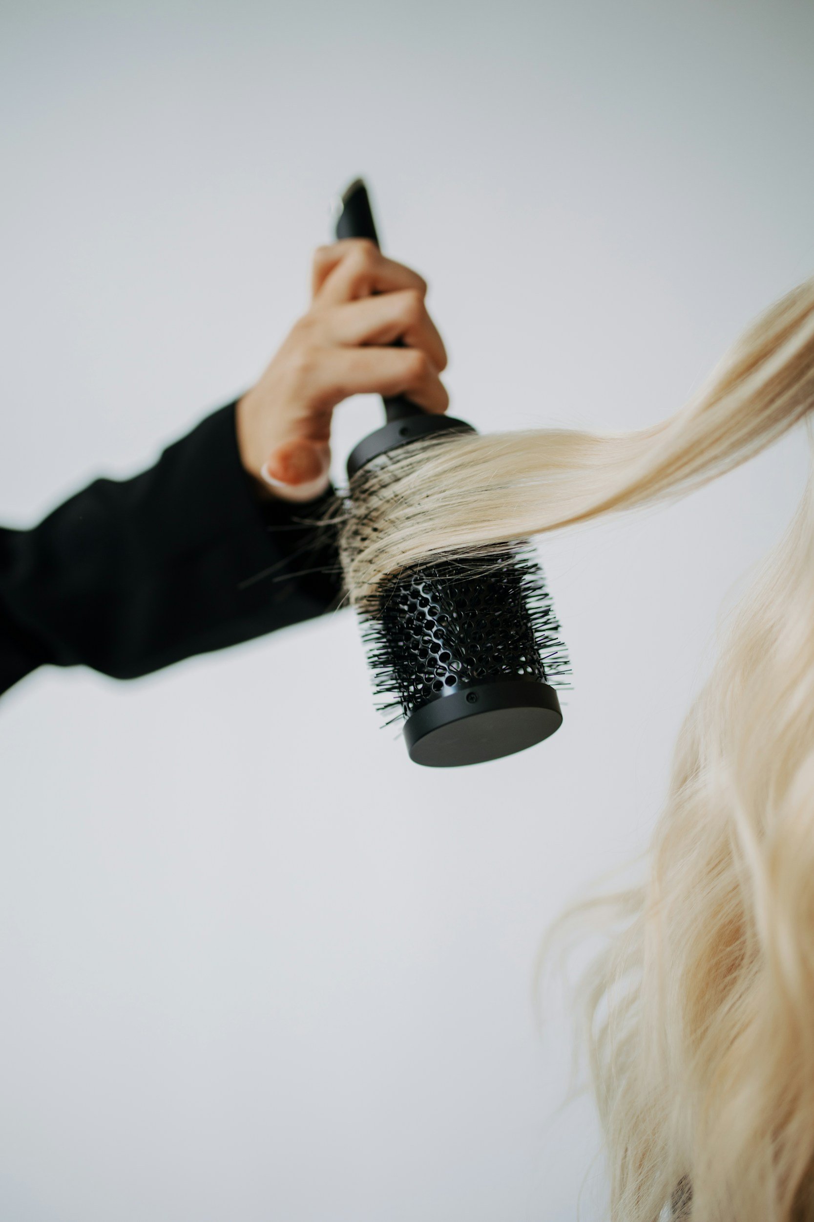 Why Your Hair Changes Over Time (And How the Right Haircut Can Adapt)