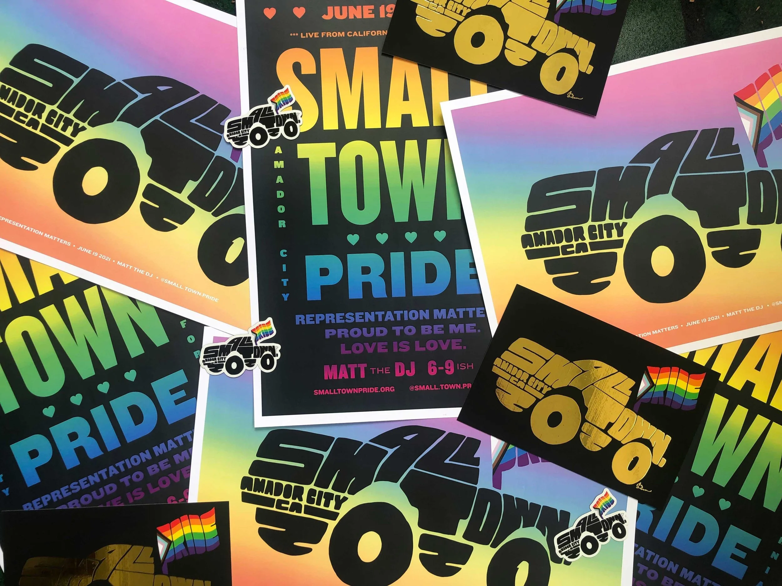 Collage of colorful posters supporting small town pride and LGBTQ+ community, with rainbow flag, text, and graphics.