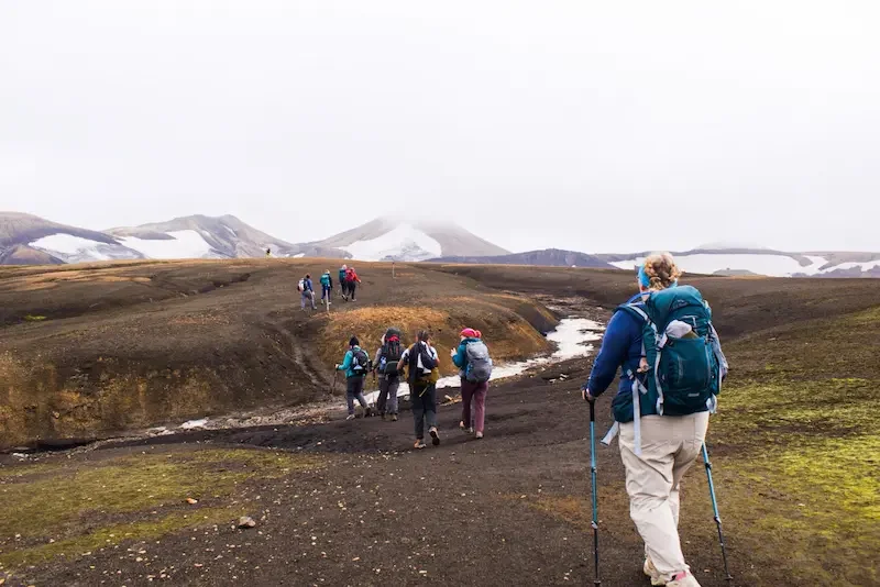 group of hikers starting on the laugavegur trek in iceland