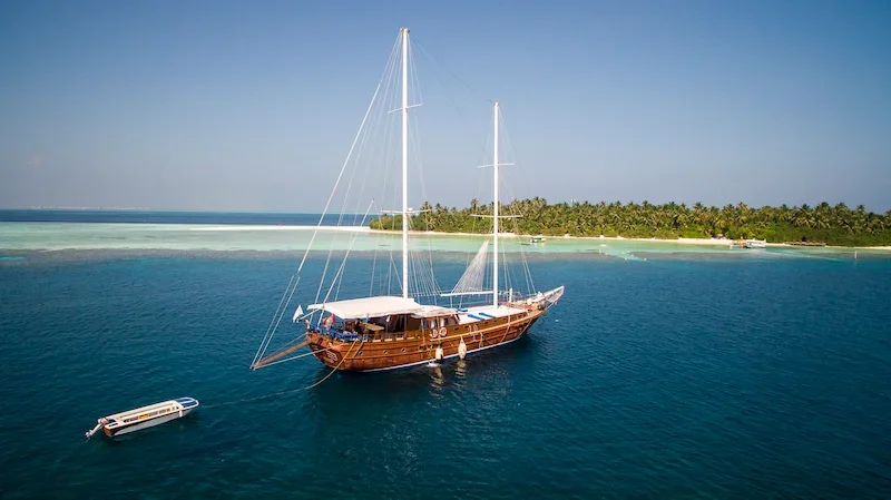 wooden sale boat off maldives island