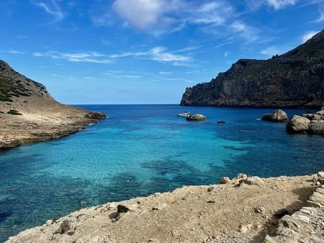view of mallorca clear blue waters from the beach