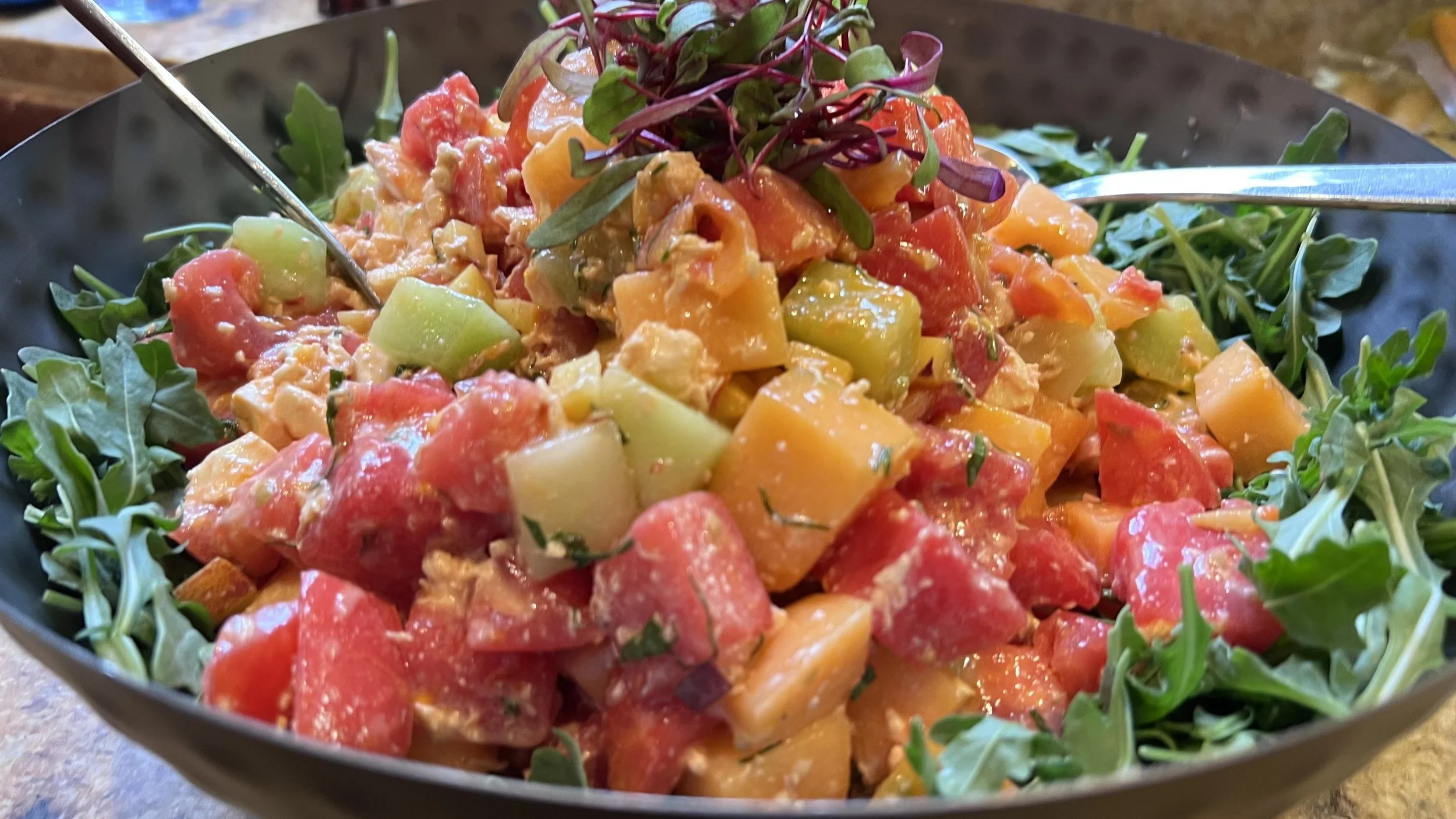 Savory Fruit Salad, Mint, Burrata, Wild Arugula, Donut Peach Vinaigrette