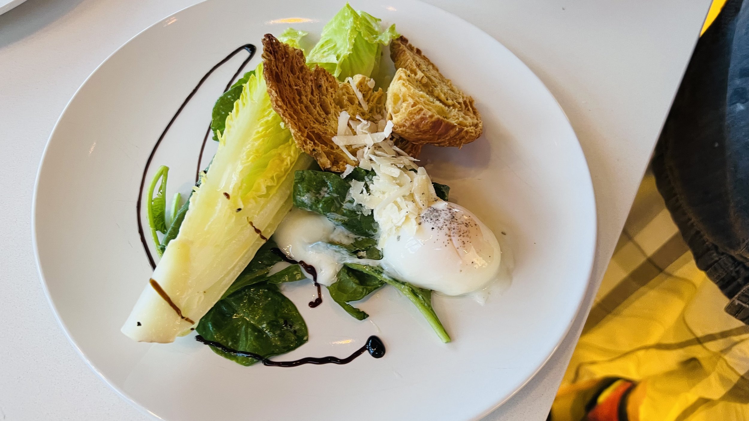 Baby Spinach & Romaine Heart Caesar Salad, 63 Degree Egg, Croissant Croute, 18 Month Reggiano 