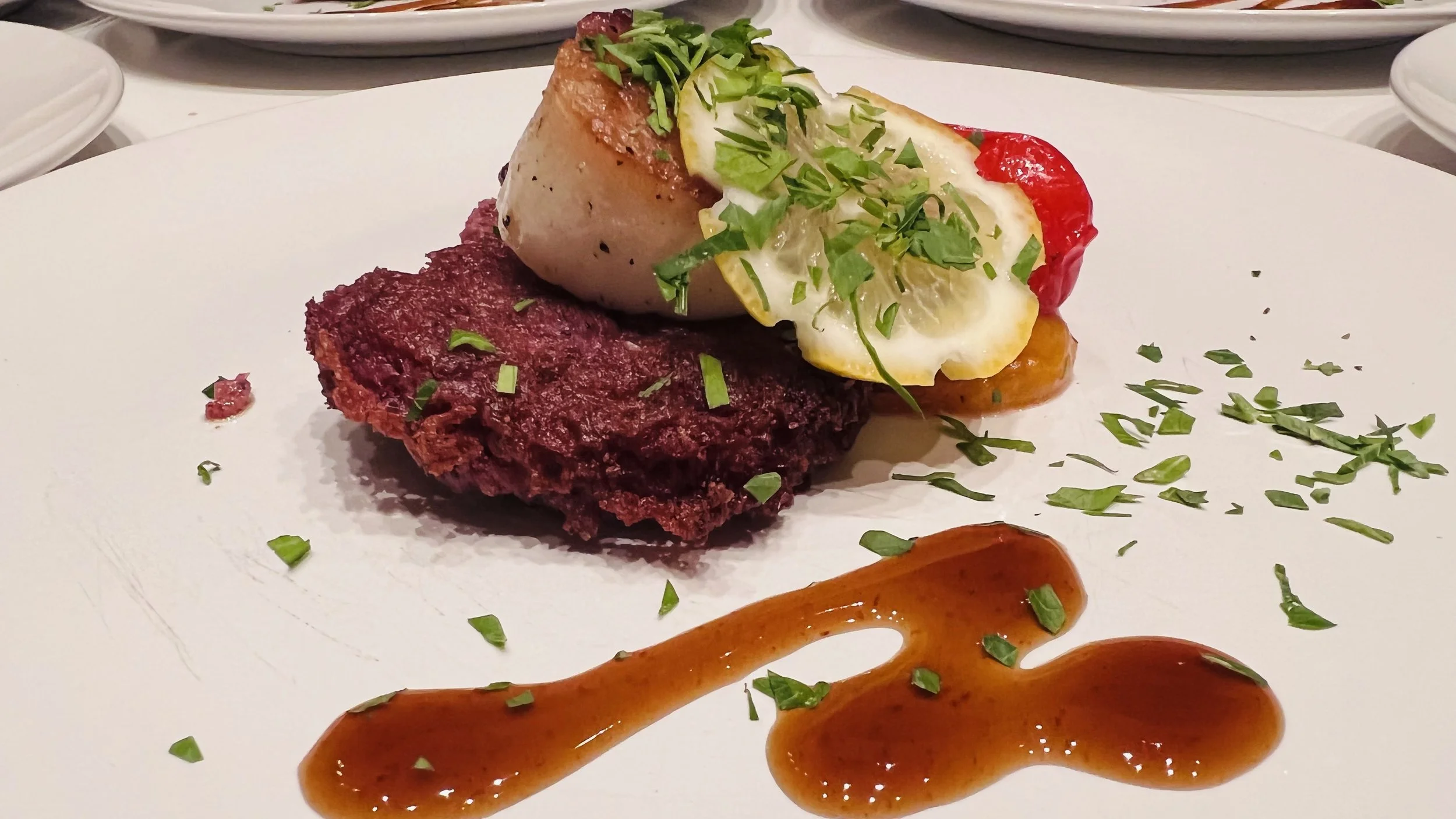 Jumbo Diver Scallop, Purple Potato Rosti, Blistered Baby Heirloom Tomatoes, Black Garlic Molasses