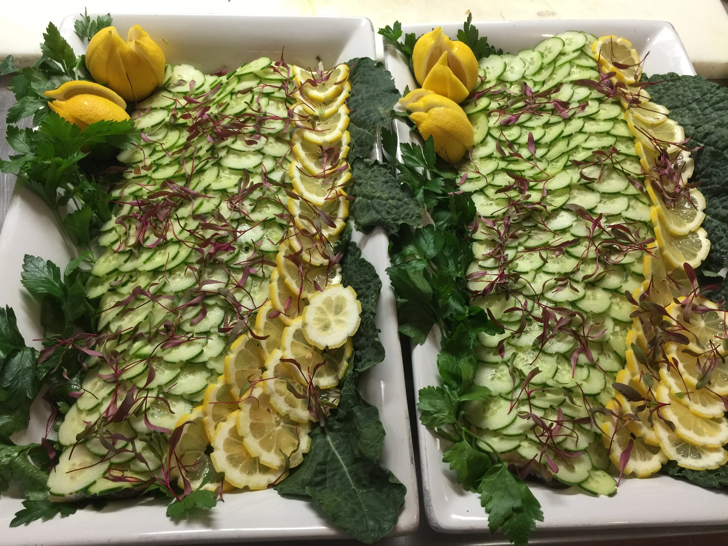 Champagne Poached Whole Salmon Sides, Cucumber Scales, Lemon-Horseradish Creme Fraiche, Garden Dinosaur Kale