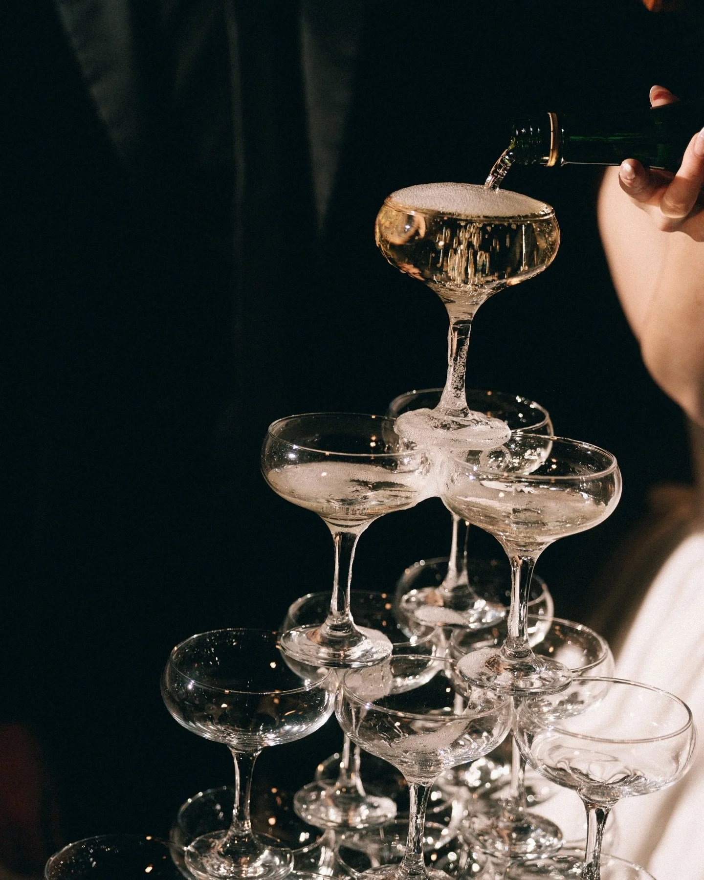 New Year energy, wedding edition. Sean &amp; Mackenzie 🥂✨ Champagne towers, indoor fireworks, black tie fits, engraved perfume, and the best people in the room. Big big BIG congrats to you two, what a way to ring in 2026 and a big honor to have cele