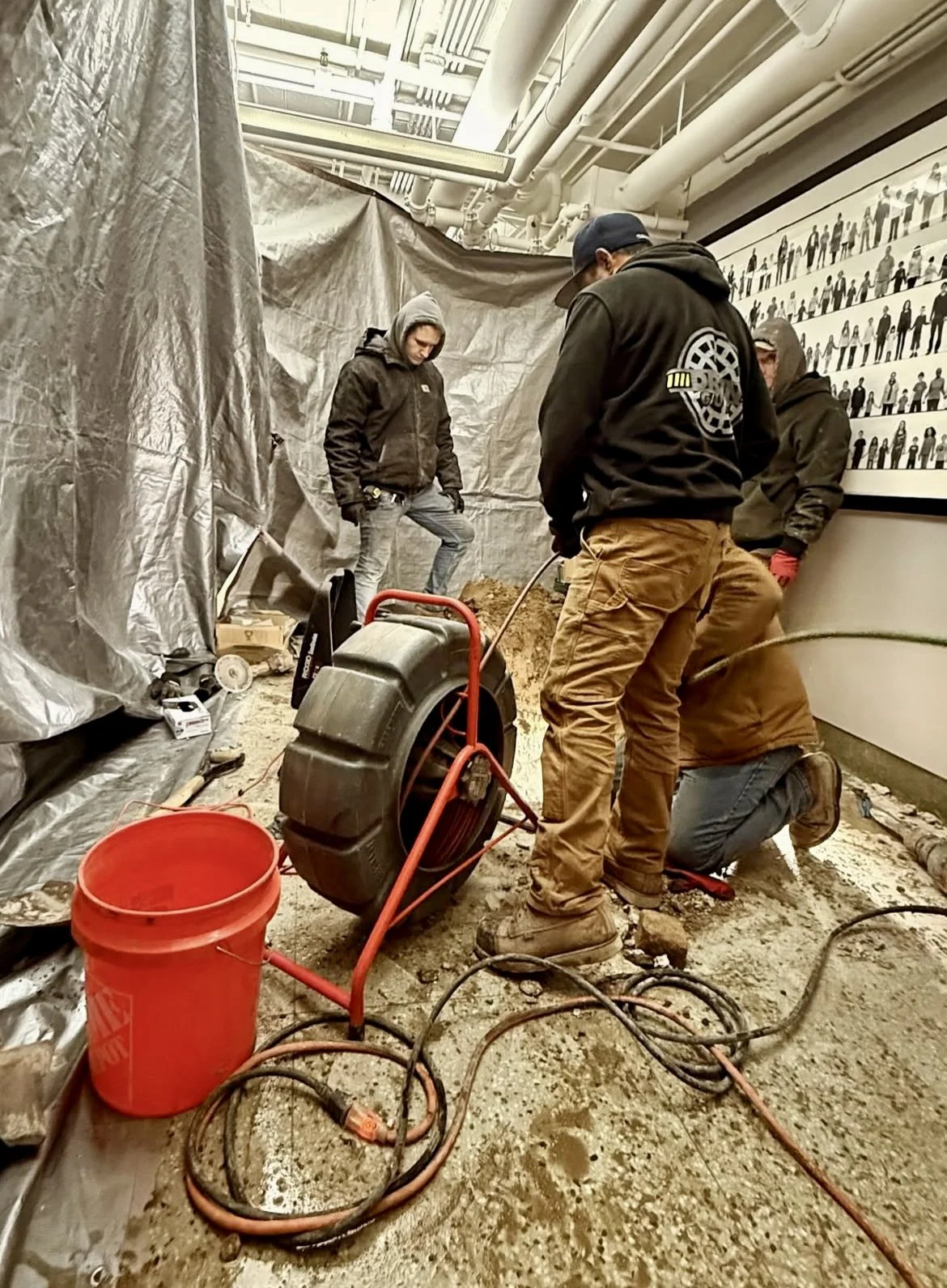 The Drain Guys team on-site repairing a sewer at a Chicago school.