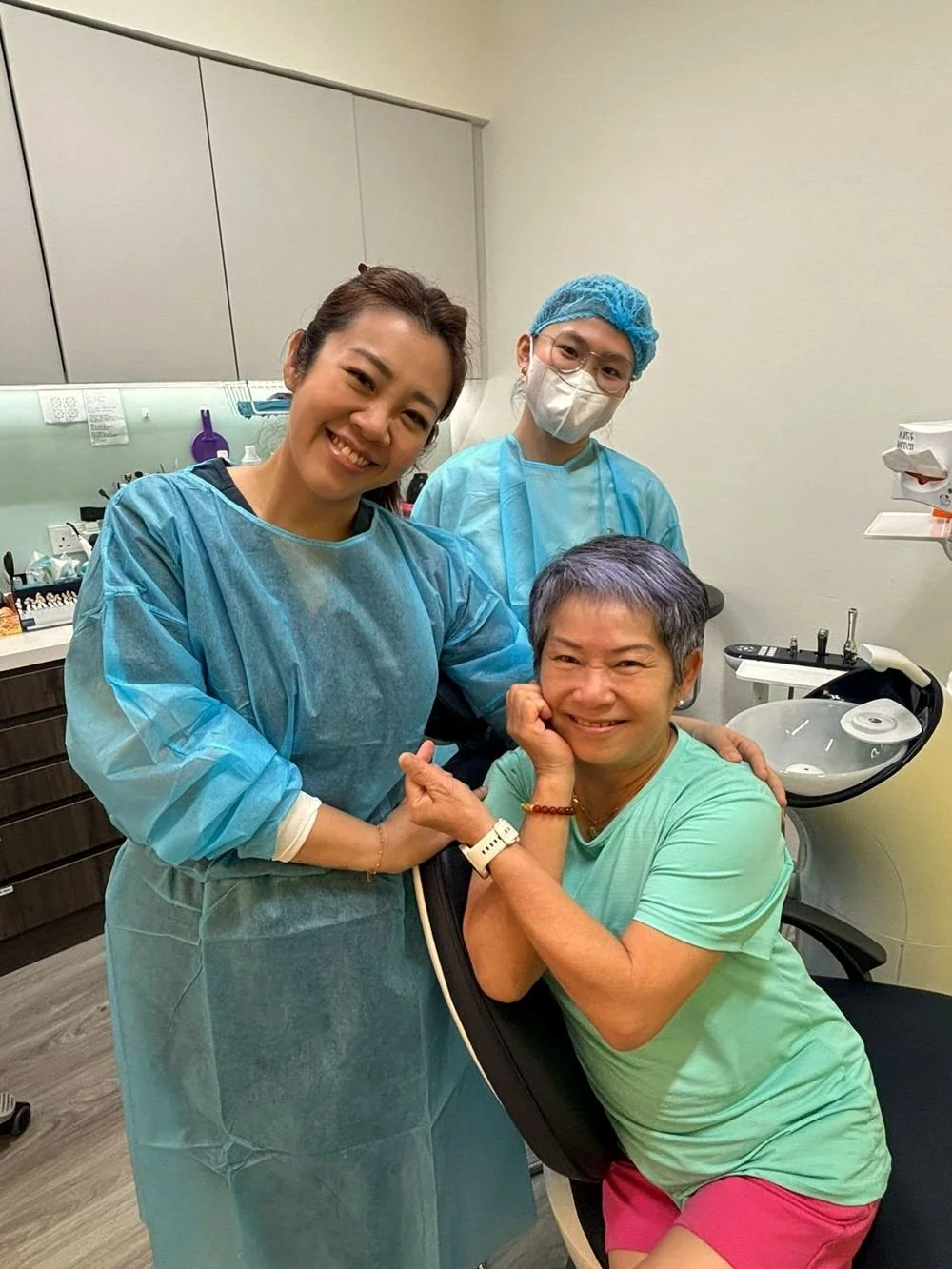 Dental team with a senior patient seated in the dental chair at Smileplus Dental