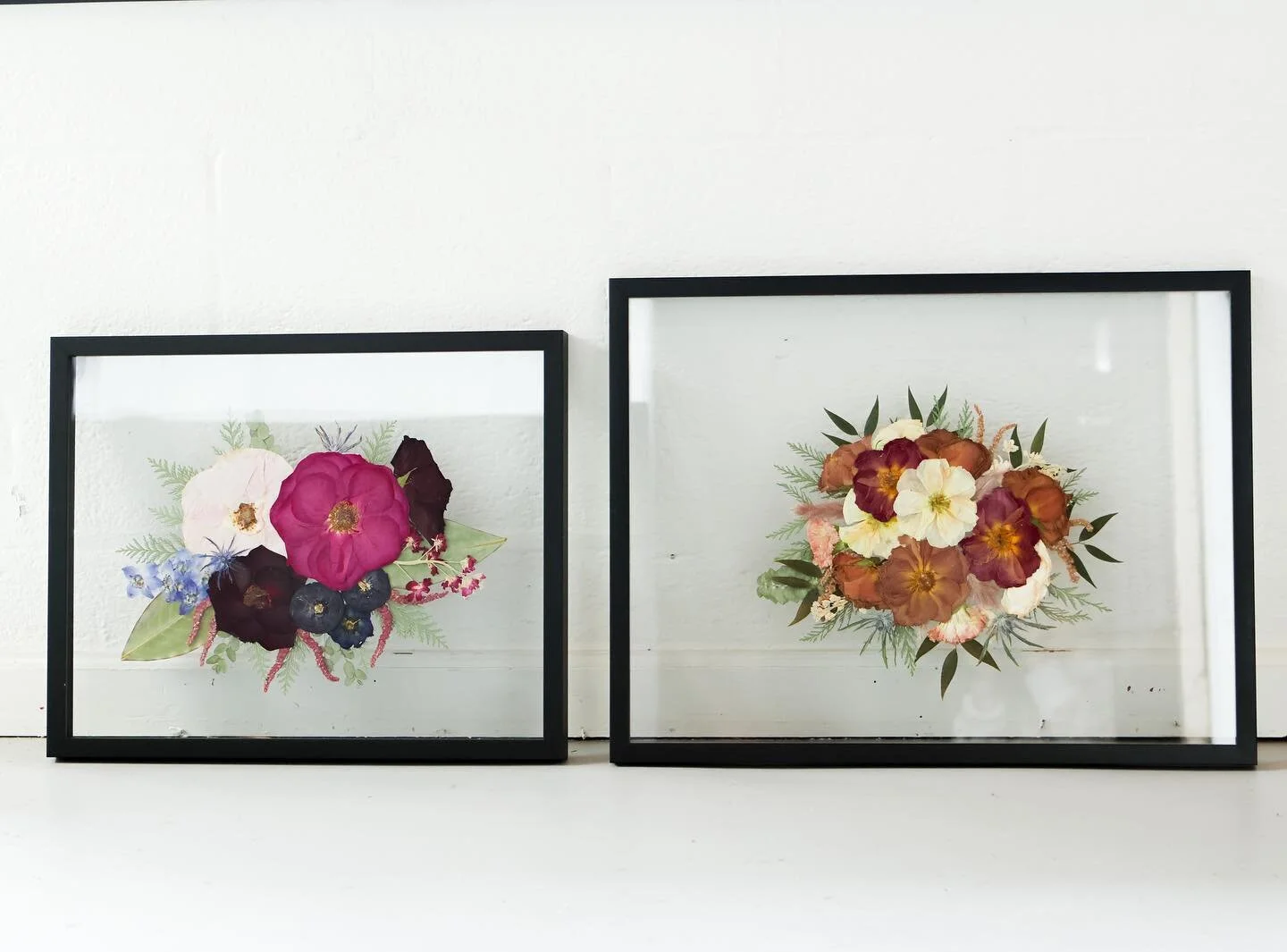A 16 x 20 and an 18 x 24 displayed side by side.  Two things to take into consideration when picking out your frame size. 
1. Size of your bouquet
2. The space you plan on displaying it

&bull;
&bull;
&bull;
#floralpreservation #pressedflowers #press