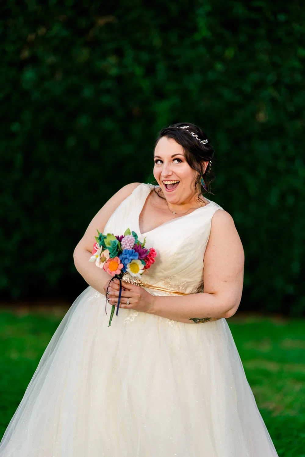 Joyful bridal portrait after an intimate Clackamas River elopement, captured outdoors in a relaxed moment.