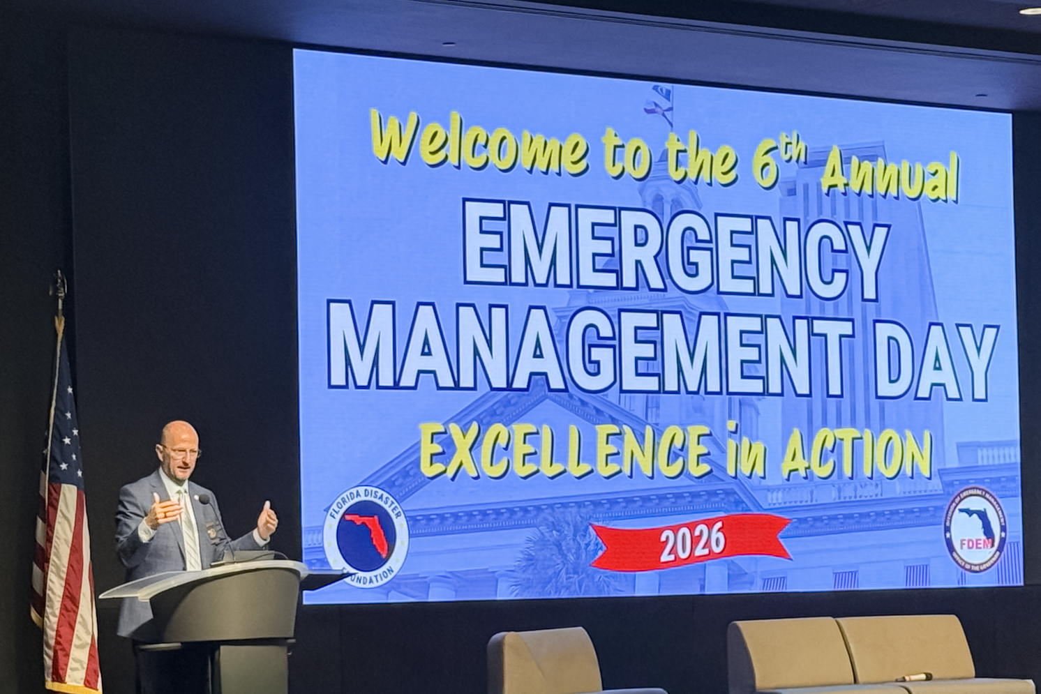 FDEM Executive Director Kevin Guthrie delivering the Excellence in Action keynote presentation at the 2026 Emergency Management Day.
