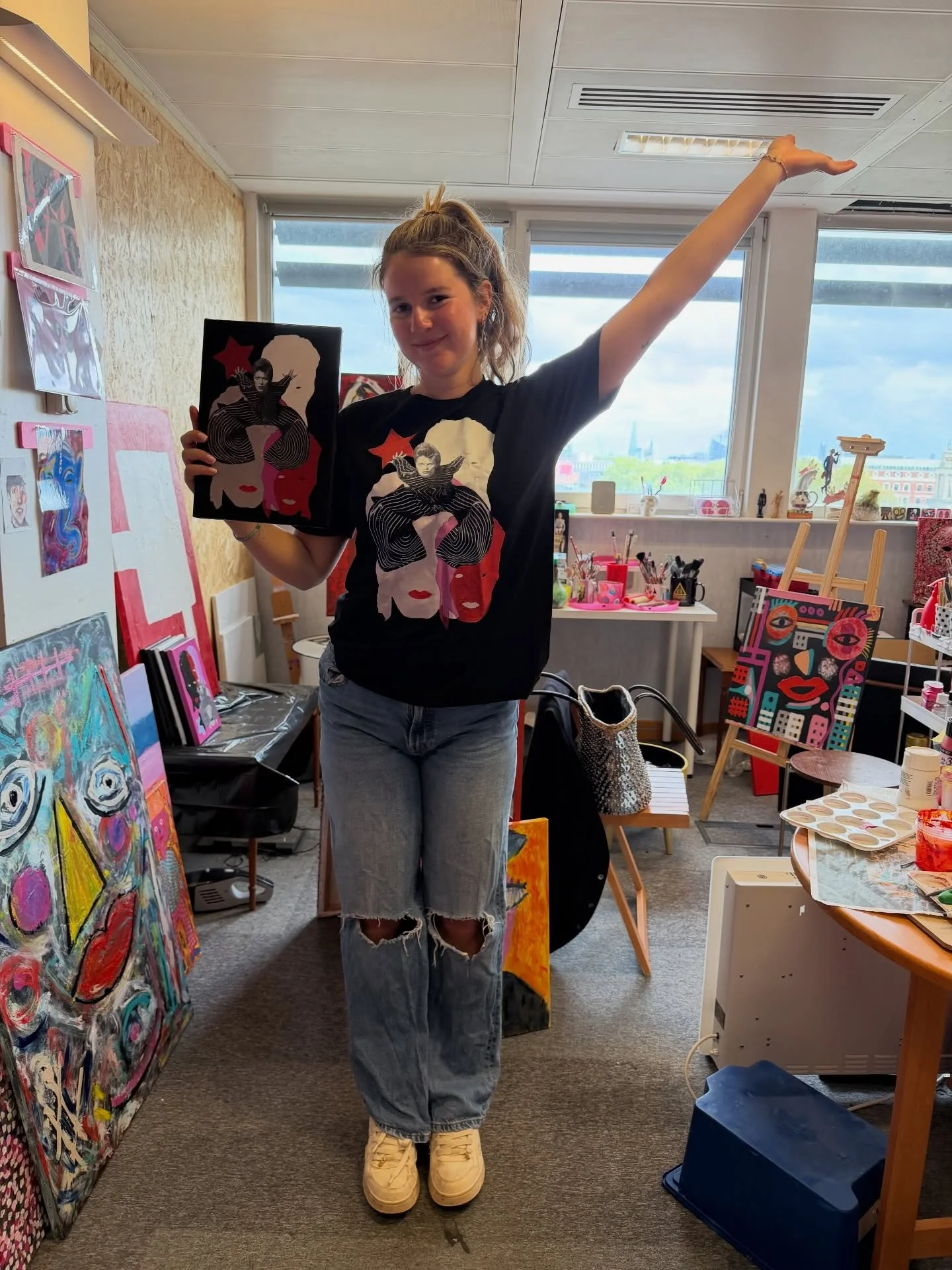 I had a special visitor to my studio yesterday @_mollymay wearing one of my Bowie tshirts holding the original collage that inspired it❤️please send me a dm if you would like one #bowieforever #grandmalove #artstudiocamden