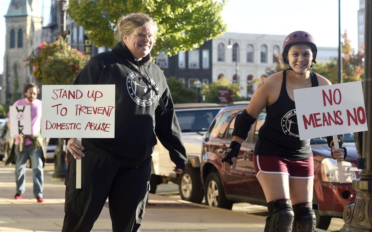 Root River Rollers Join ‘Walk a Mile in Her Shoes’