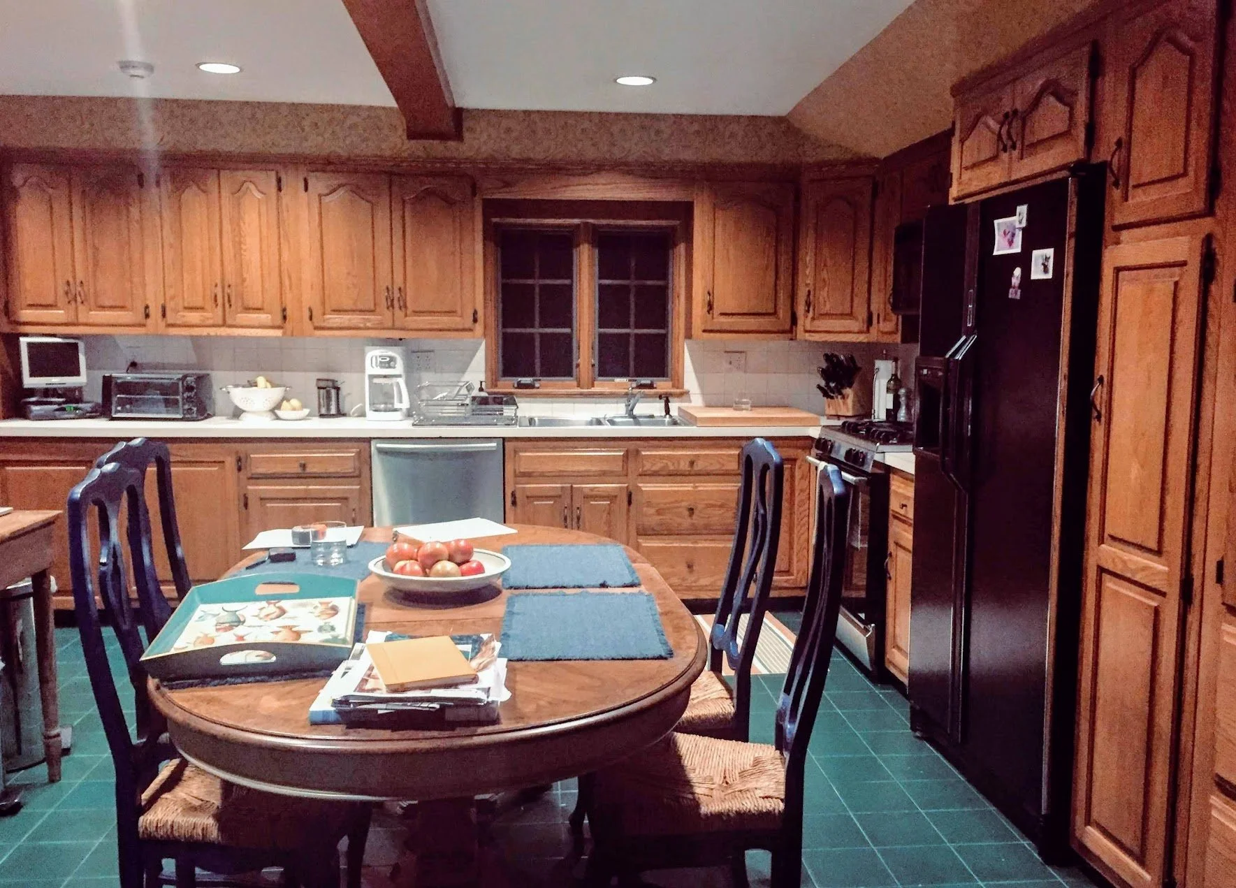 Before renovation: kitchen in a Bronxville Tudor home prior to custom remodeling and updated finishes.