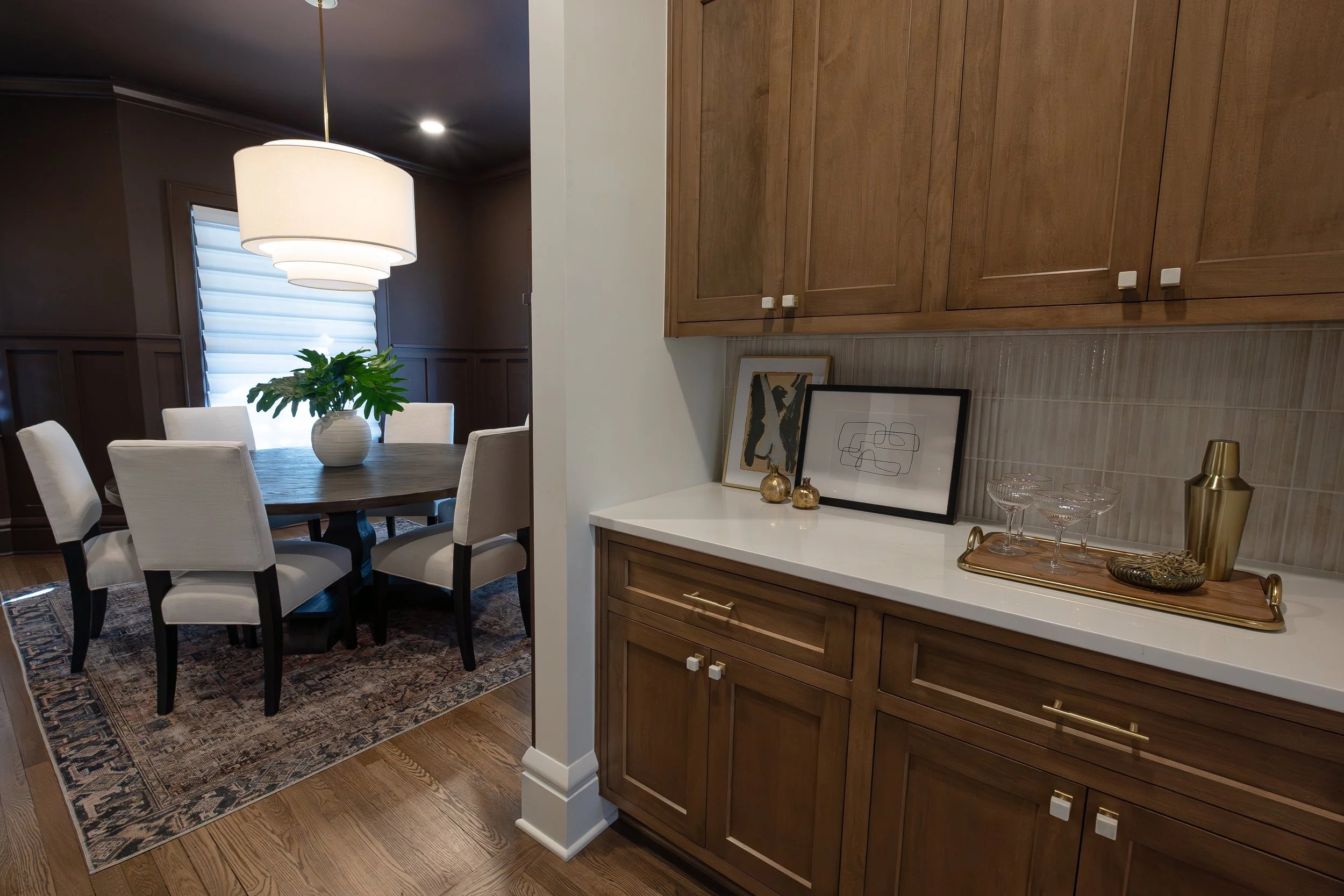 2024.11_Curate Interiors_703 Oxford St_Cabinets betweeen Kitchen and Dining_2_Kwebb-11 (1).jpg