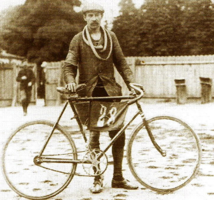 Rider from the first Tour de France with bicycle tubes around his neck
