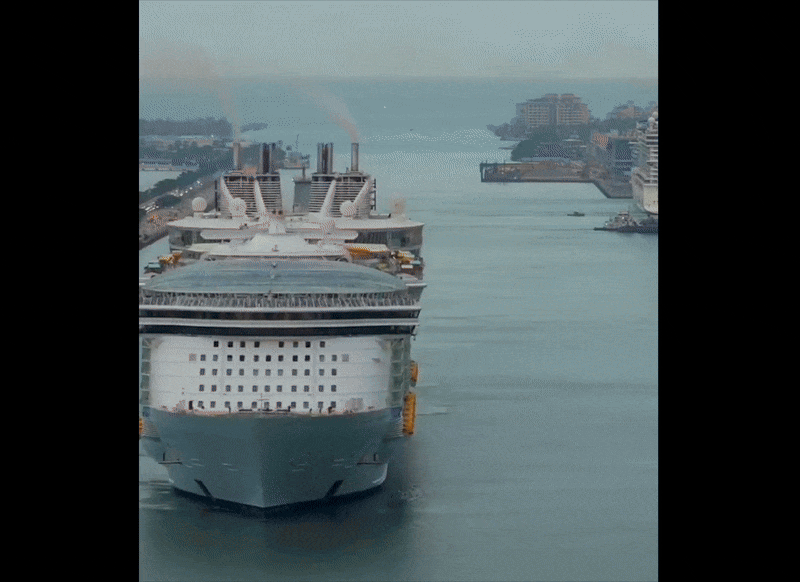 GIF showing a cruise ship making a 360-degree turn in port.