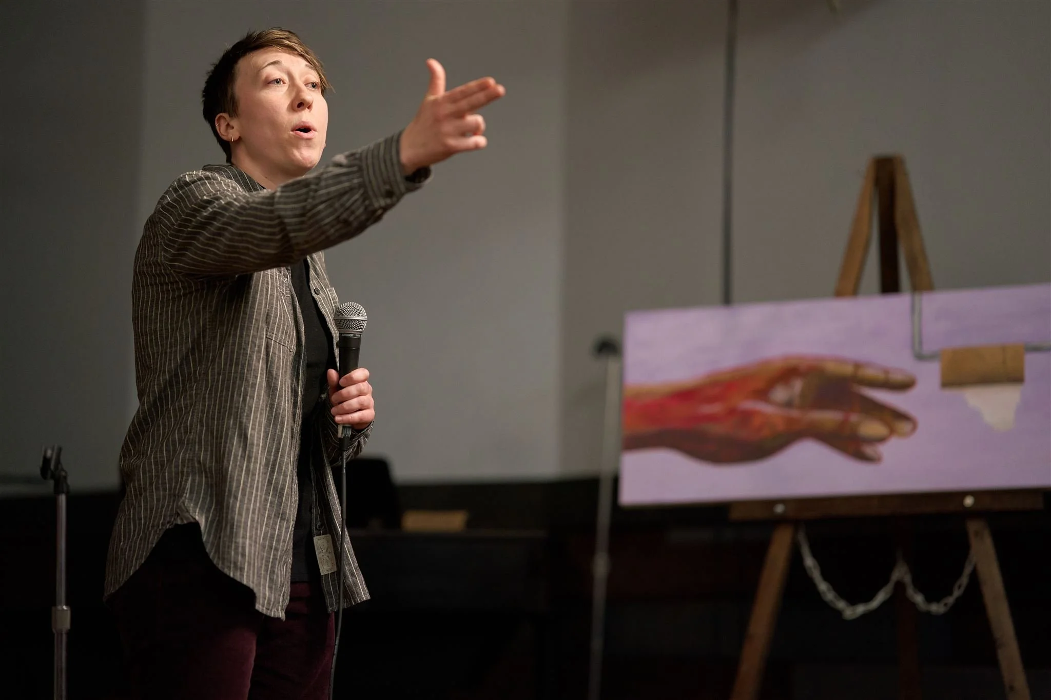 A poet performs a powerful piece of spoken word art during at Uncommon Grounds in Aliquippa, PA.