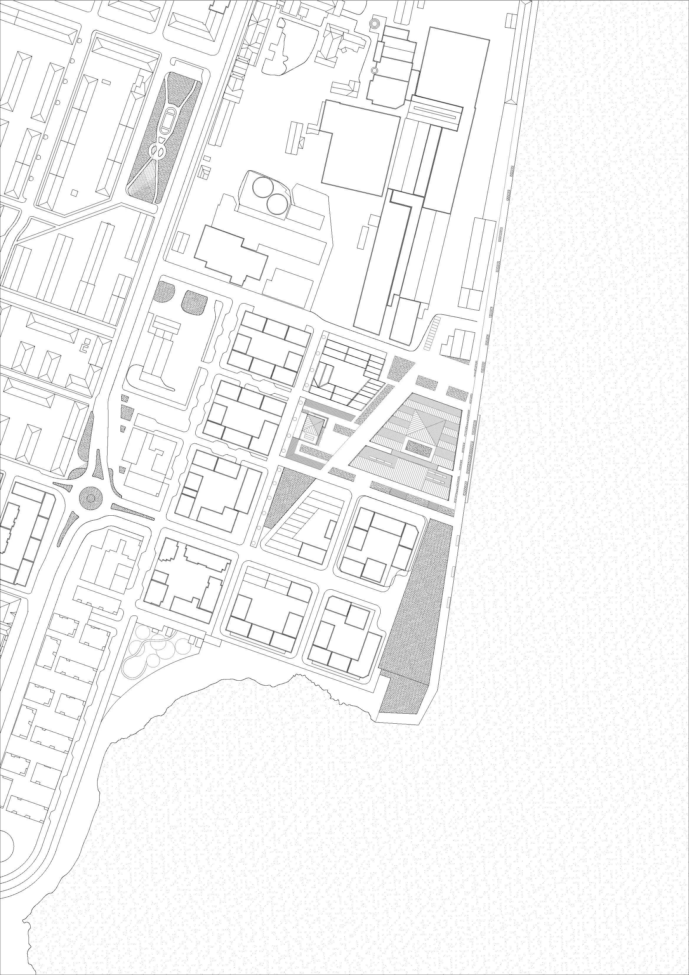 A detailed black and white city map showing streets, buildings, parks, and a waterfront.