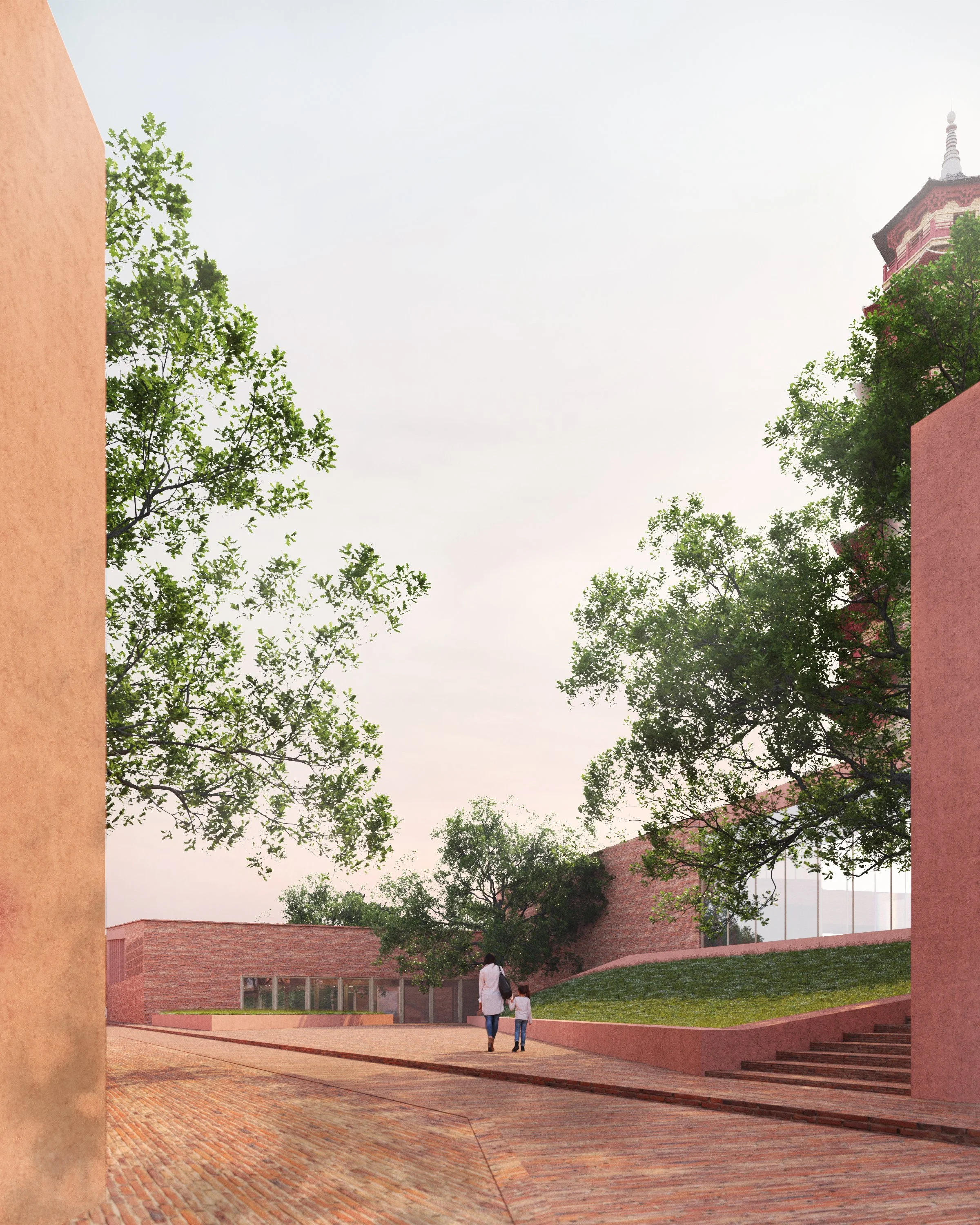 Two people, an adult and a child, walking together in a courtyard surrounded by red brick buildings and trees with green leaves.