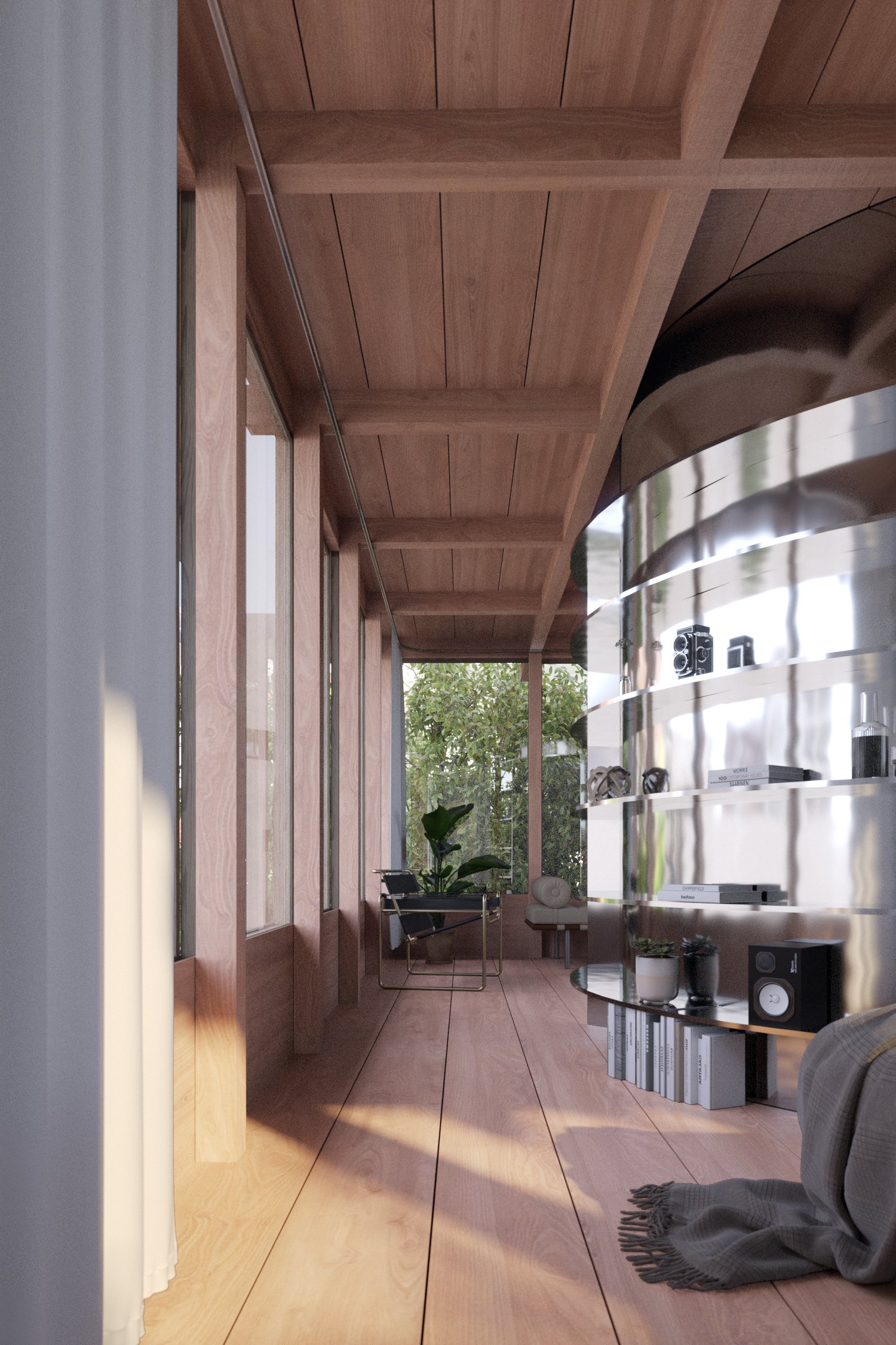 A modern interior space with wooden flooring and ceiling, large windows allowing natural light, a glass table with decorative items and books, and a seating area with a plant and a gray chair with a throw blanket.