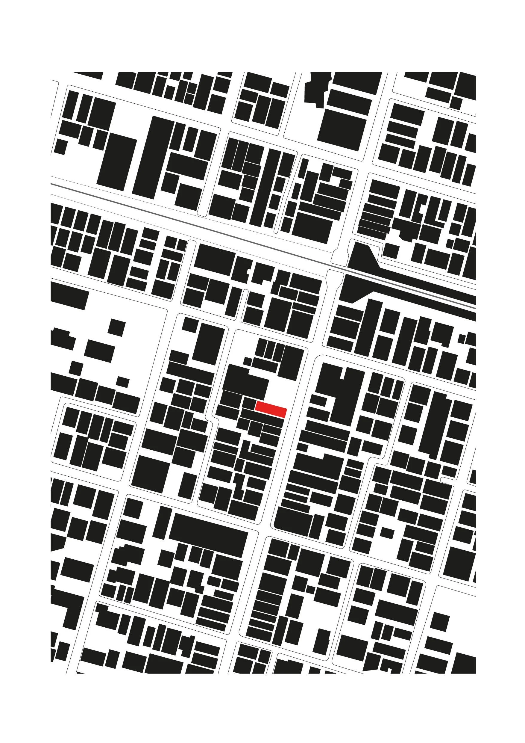 Black and white city map with streets and building outlines, a red-marked location near the center.