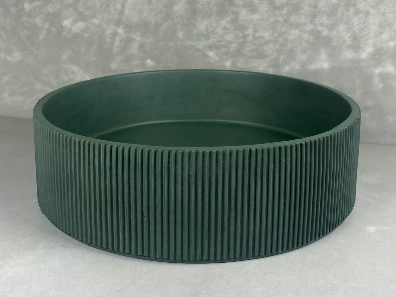 Forest green concrete basin with corrugated detail