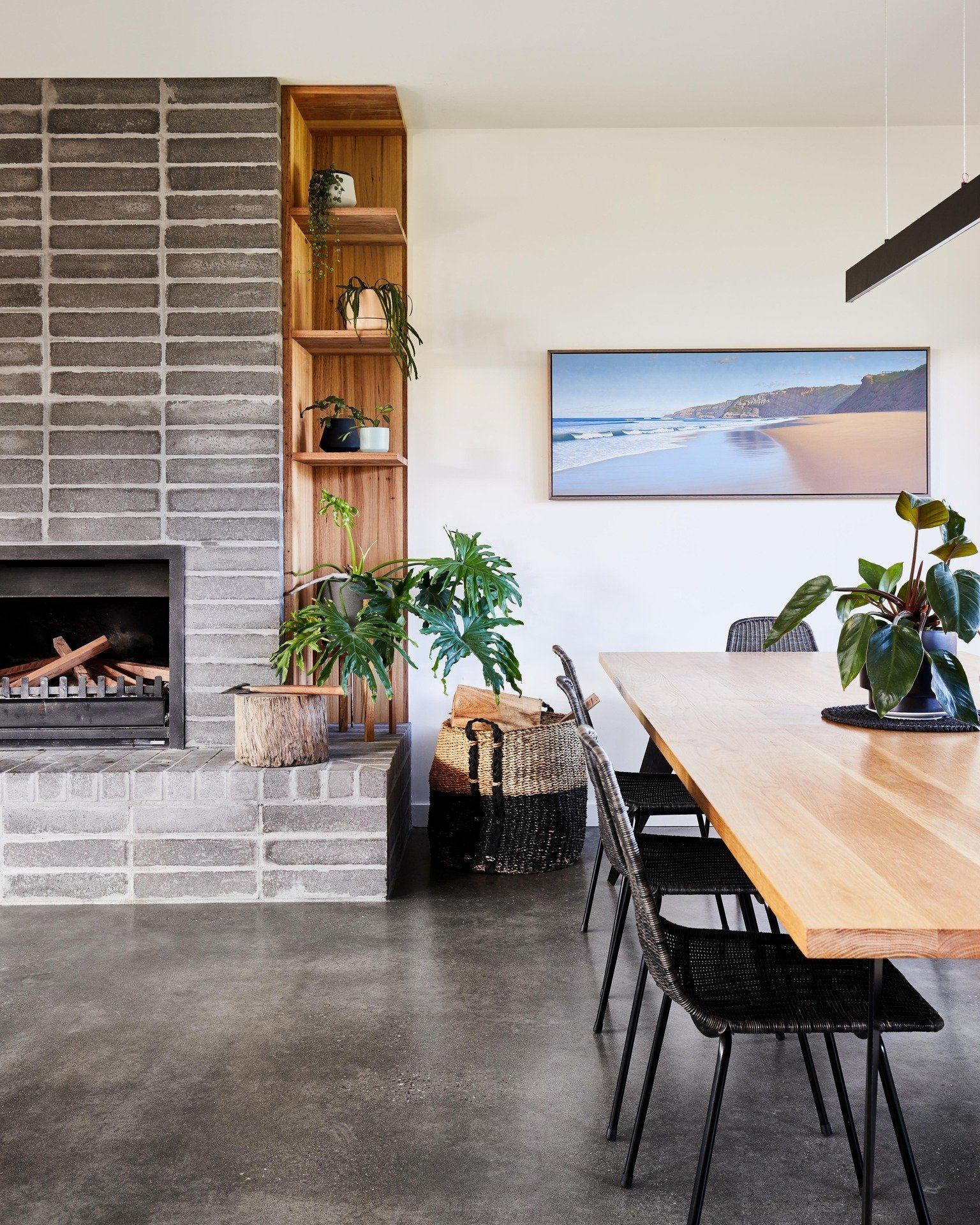 We love our clients use of timber shelving in the fireplace surround! #diningroomdesign