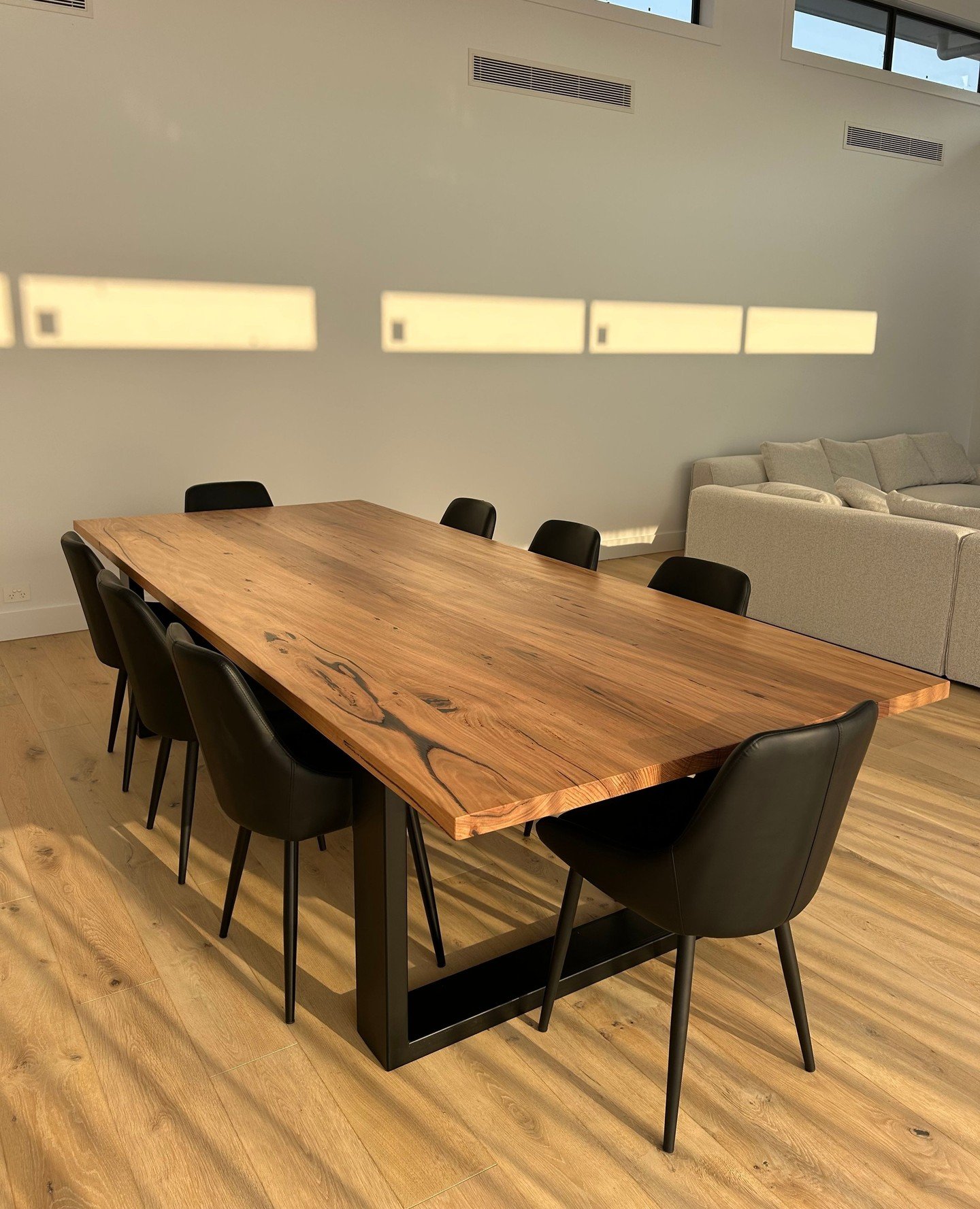 Our clients recently shared their stunning space featuring our Jarosite Dining Table. The table design brings together the rich character of recycled Messmate timber and the sleek lines of black steel legs.⁠
⁠
The modern yet timeless design is the pe